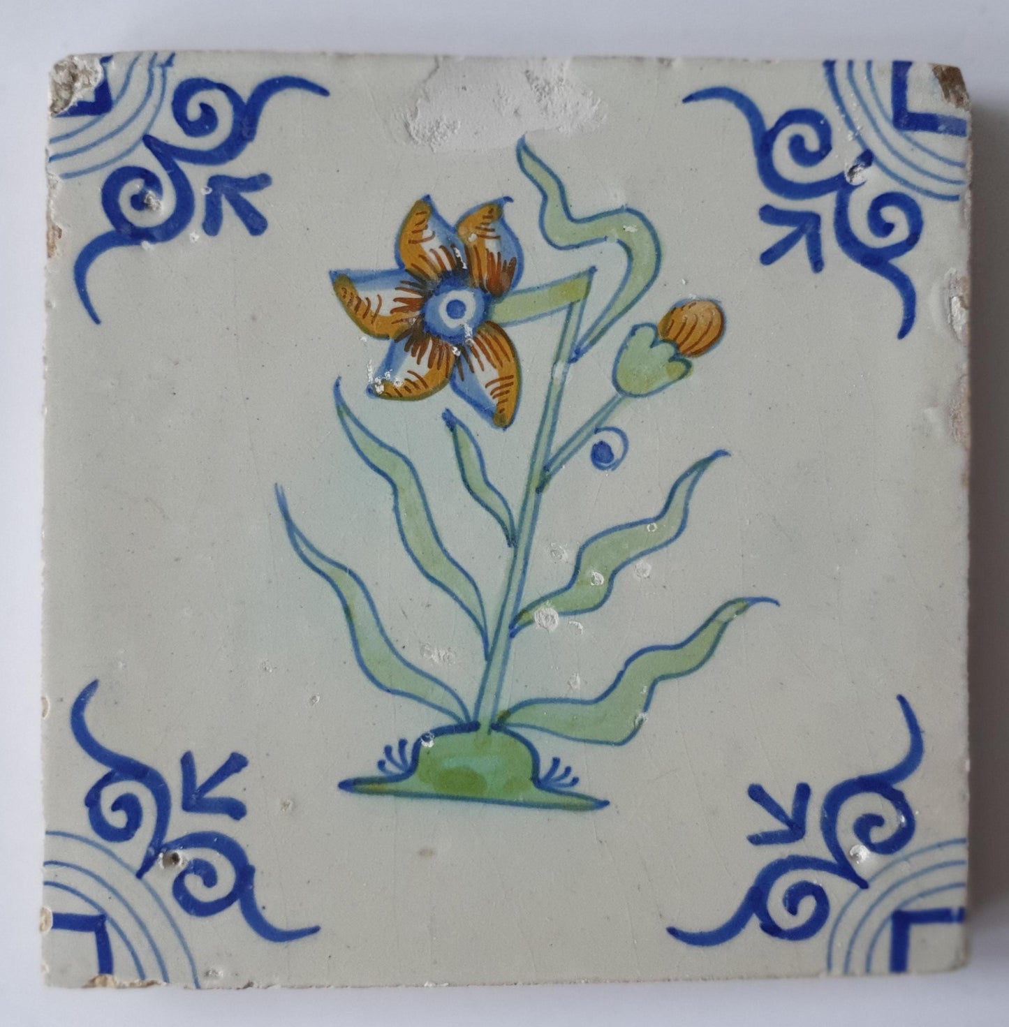 Antique Delft Tile - Polychrome Flower, Oxhead Motifs, c. 1630