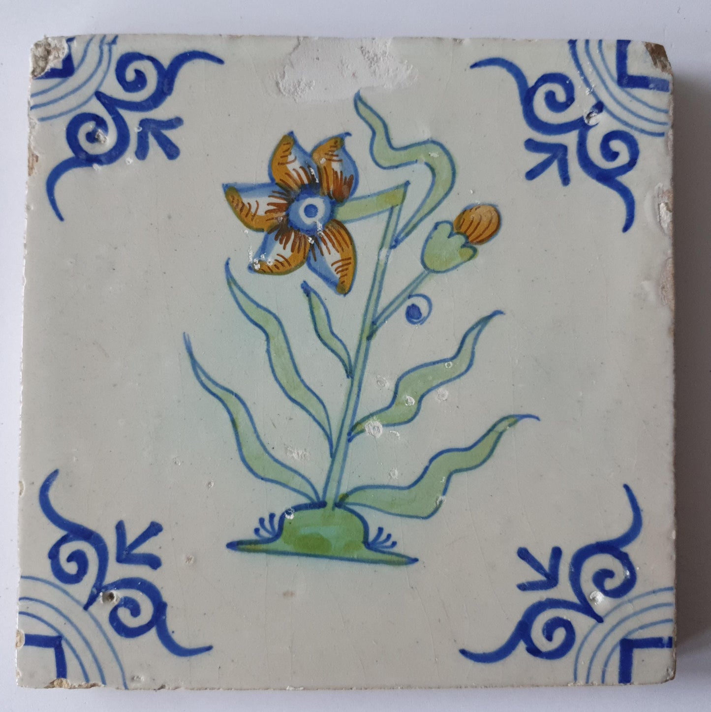 Antique Delft Tile - Polychrome Flower, Oxhead Motifs, c. 1630