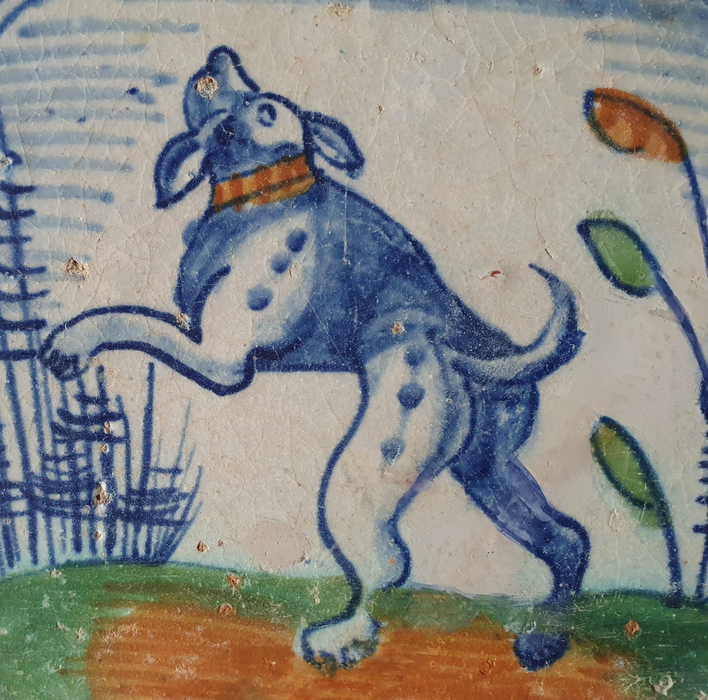This rare Delft tile with dog .                around 1620