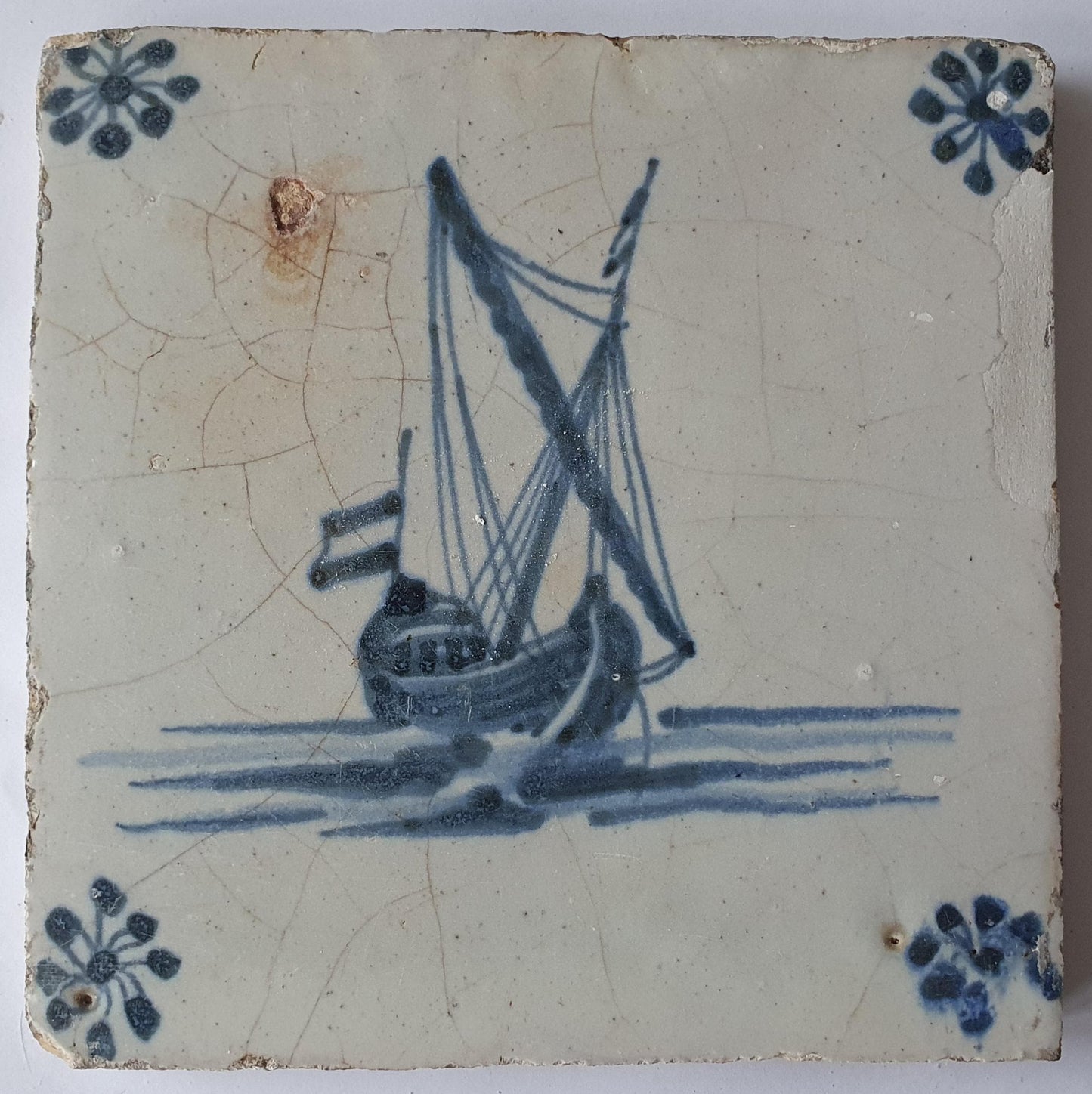 This Delft tile, dating from around 1660, depicts   sailship