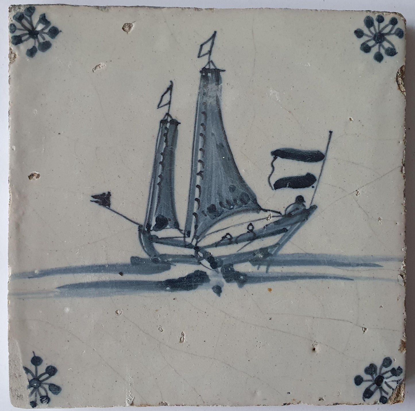 This Delft tile, dating from around 1660, depicts   sailship