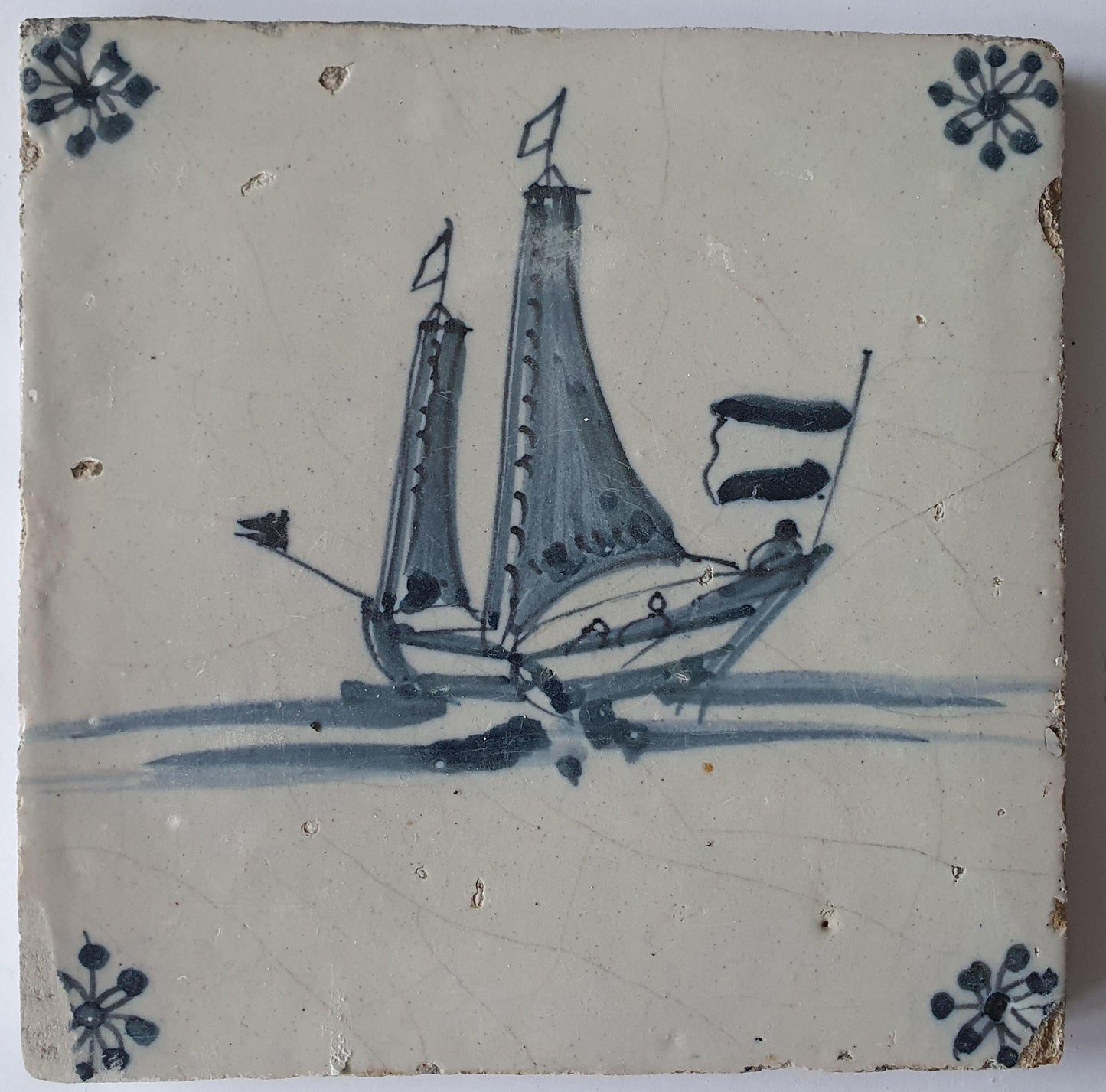 This Delft tile, dating from around 1660, depicts   sailship