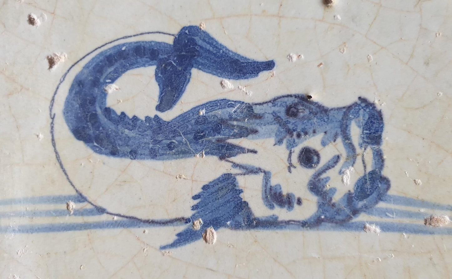 Antique Delft Tile – 17th Century Dutch Fish Design oxhead corner