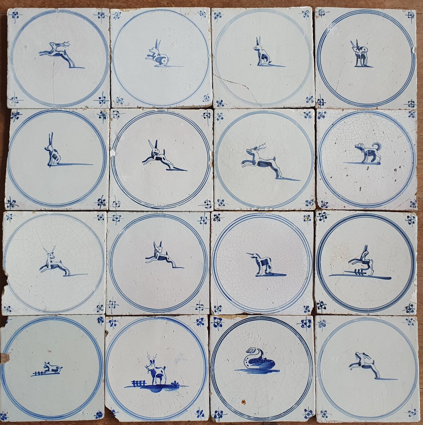 Set of 16 Antique Delft Tiles, 18th Century Animal Motifs circle springer