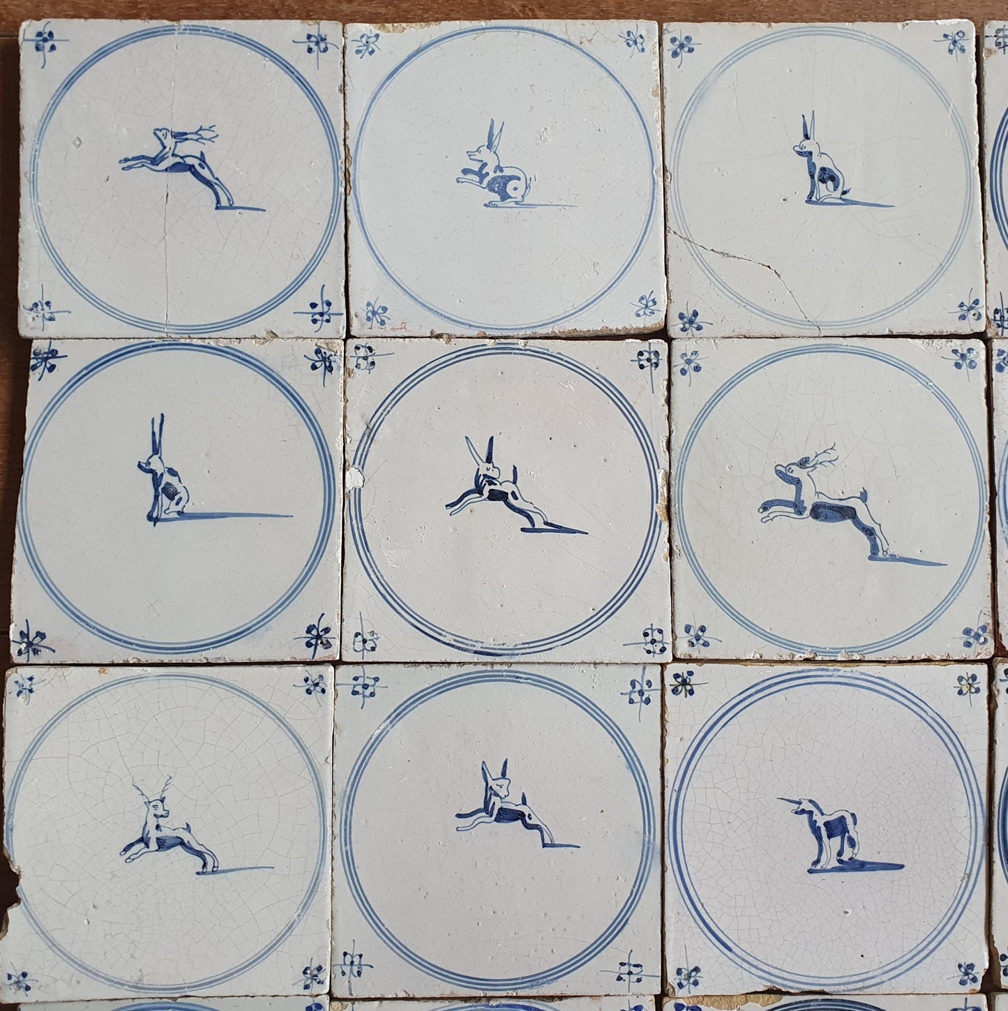 Set of 16 Antique Delft Tiles, 18th Century Animal Motifs circle springer
