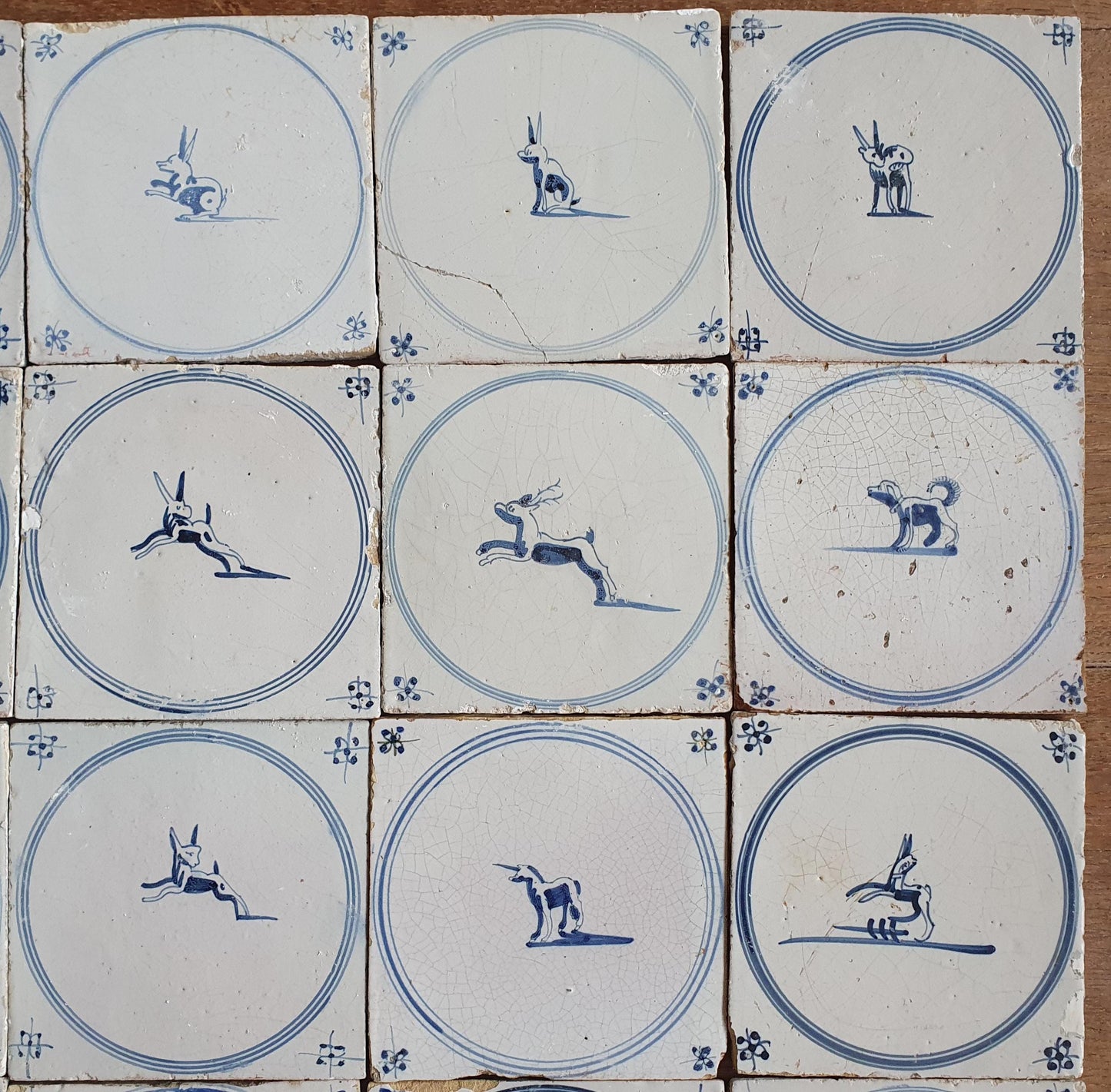 Set of 16 Antique Delft Tiles, 18th Century Animal Motifs circle springer