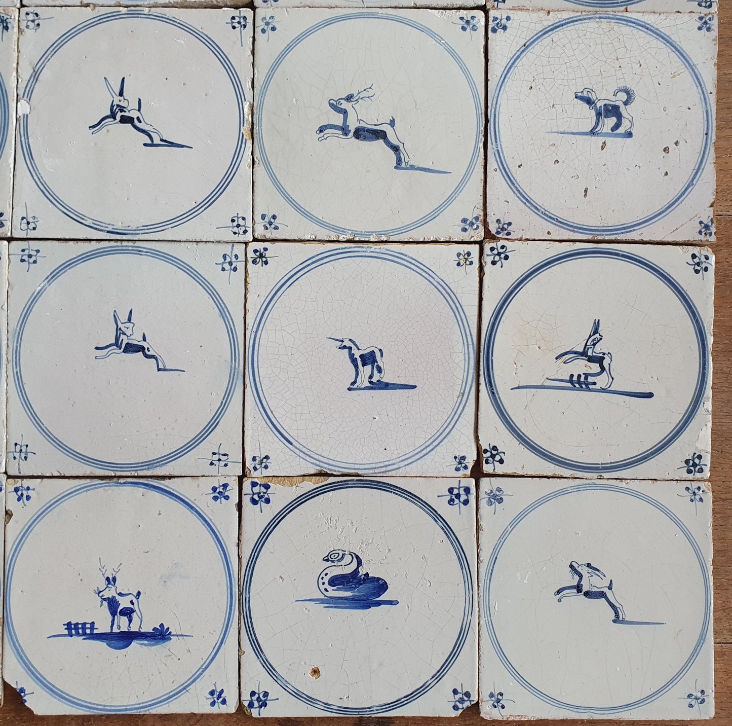 Set of 16 Antique Delft Tiles, 18th Century Animal Motifs circle springer