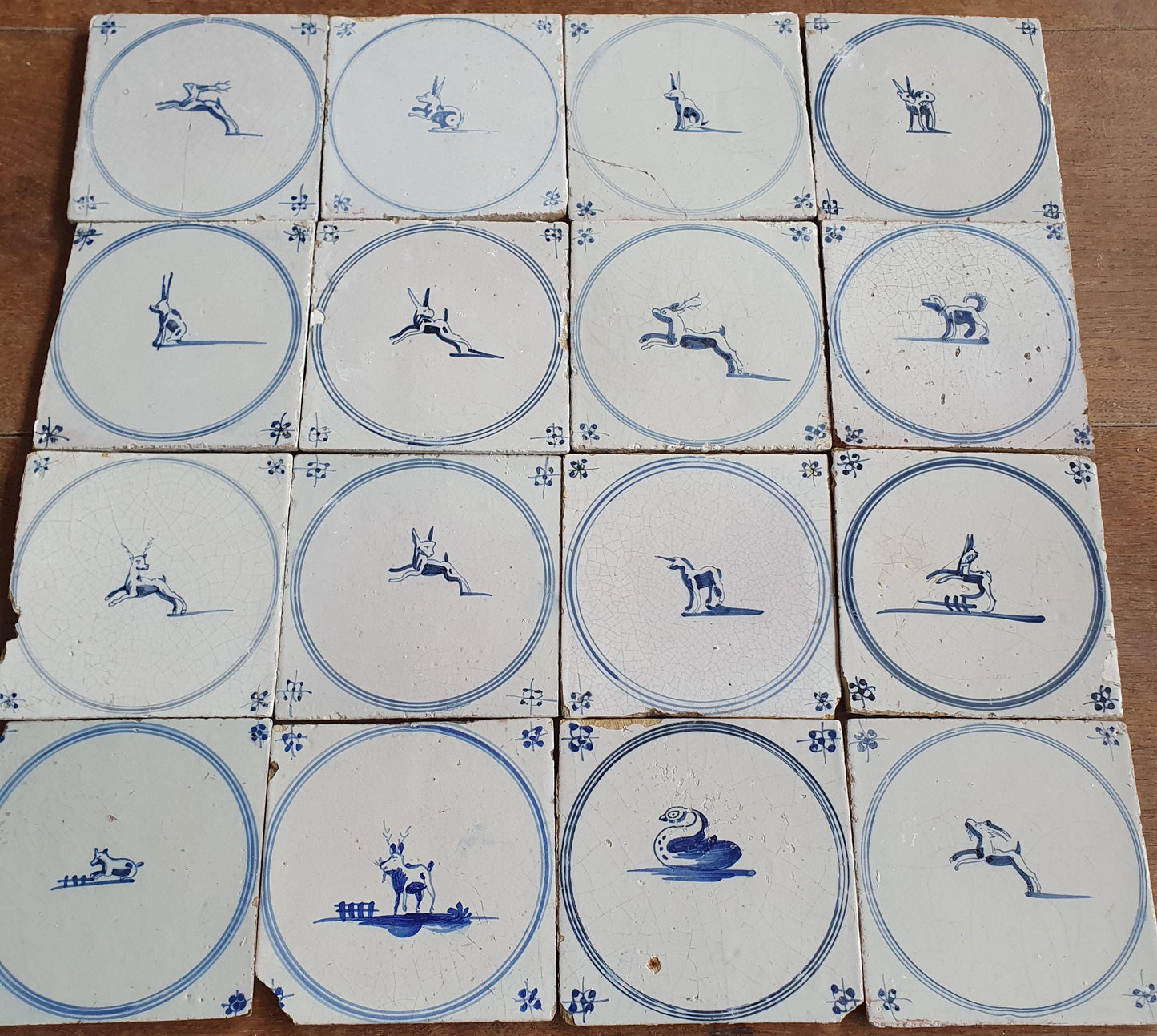 Set of 16 Antique Delft Tiles, 18th Century Animal Motifs circle springer