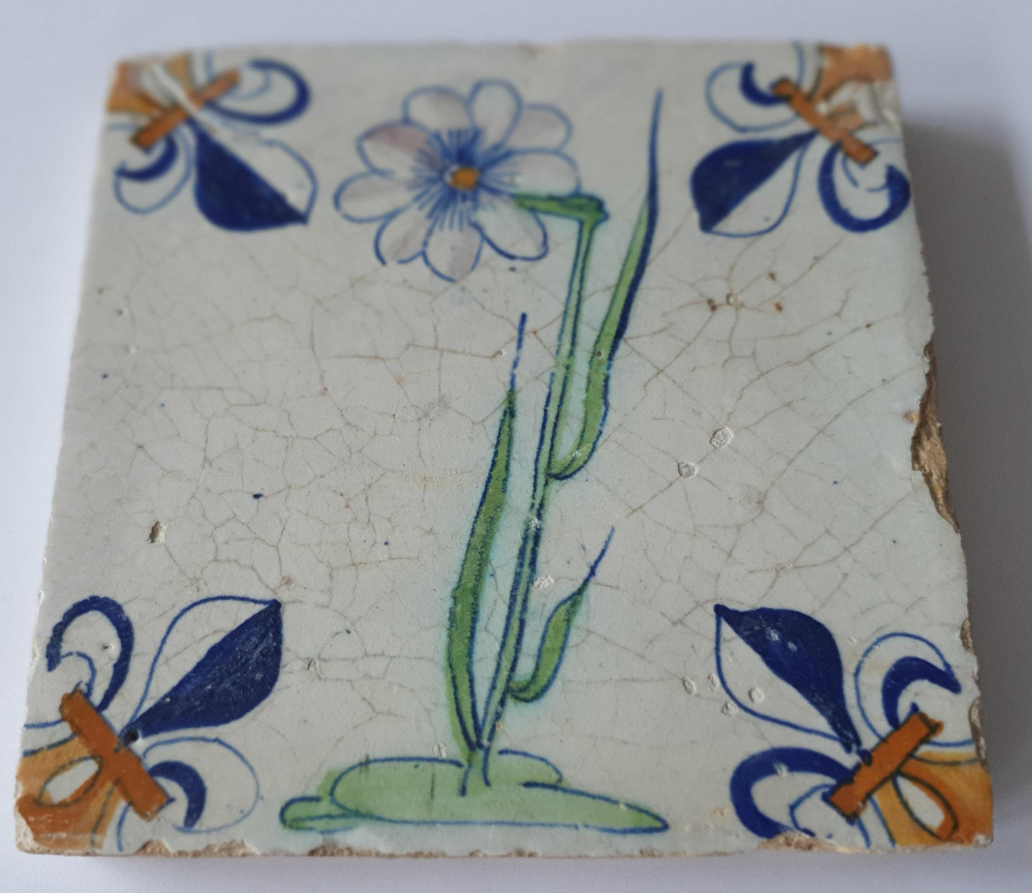 dutch flower  Gouda rare delft polychrome tile, 1620