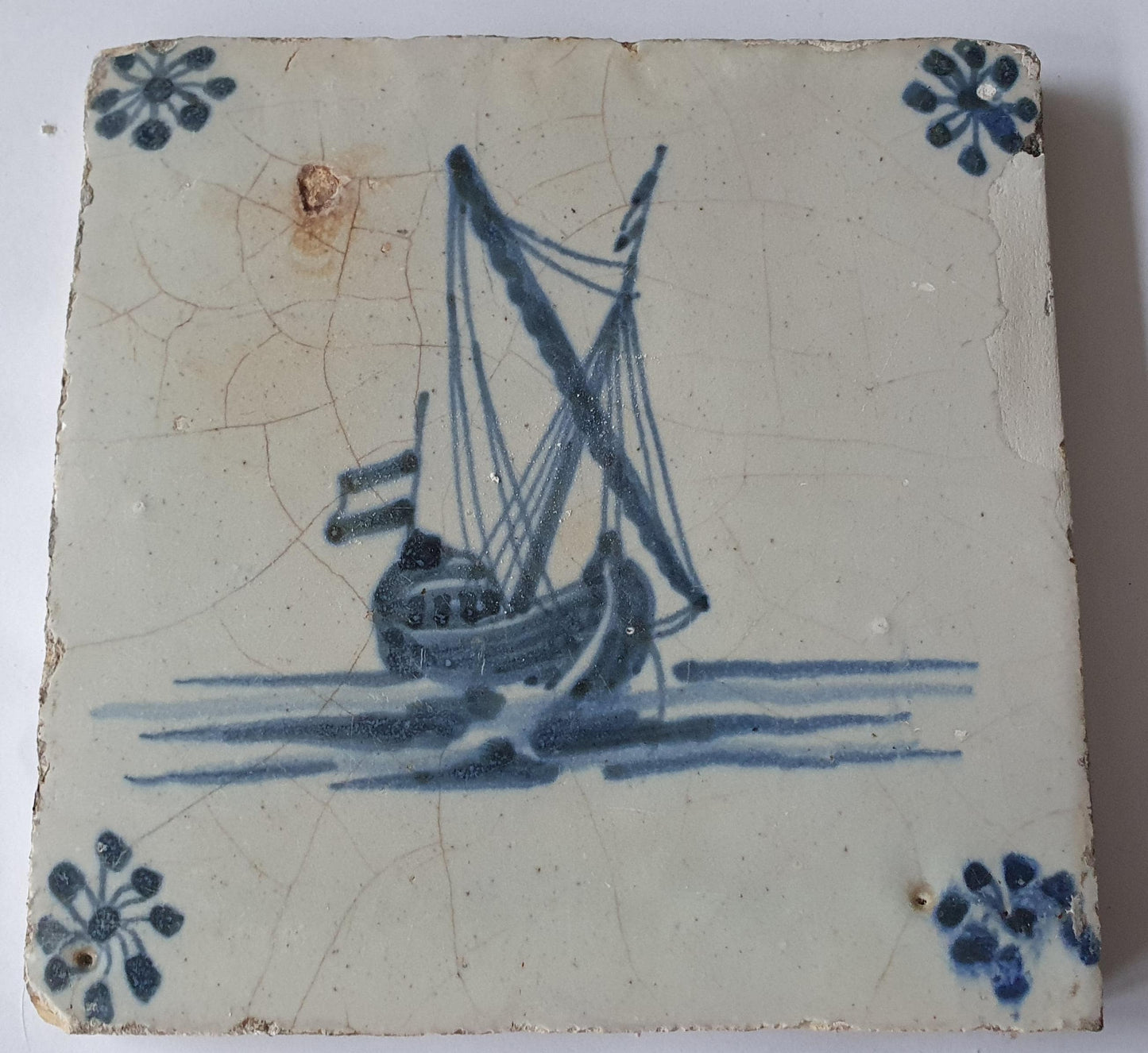 This Delft tile, dating from around 1660, depicts   sailship