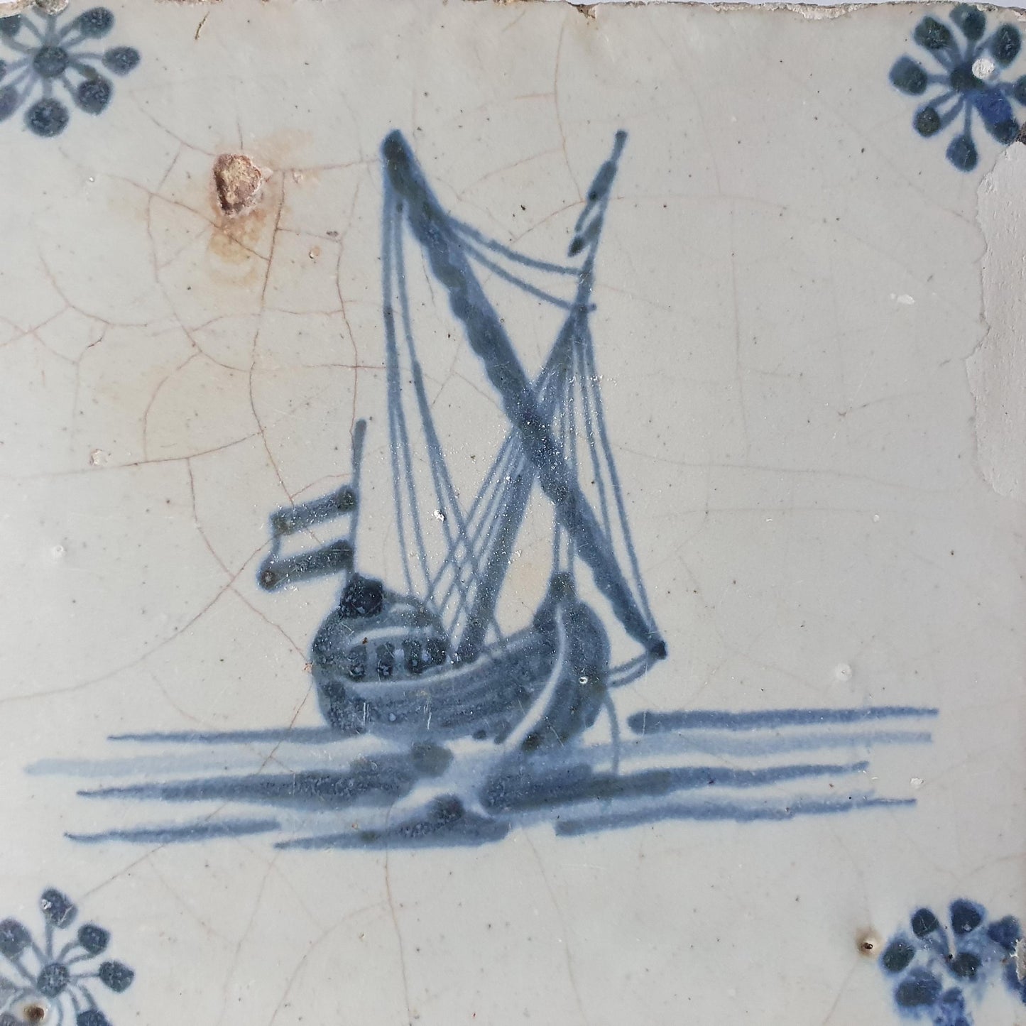 This Delft tile, dating from around 1660, depicts   sailship