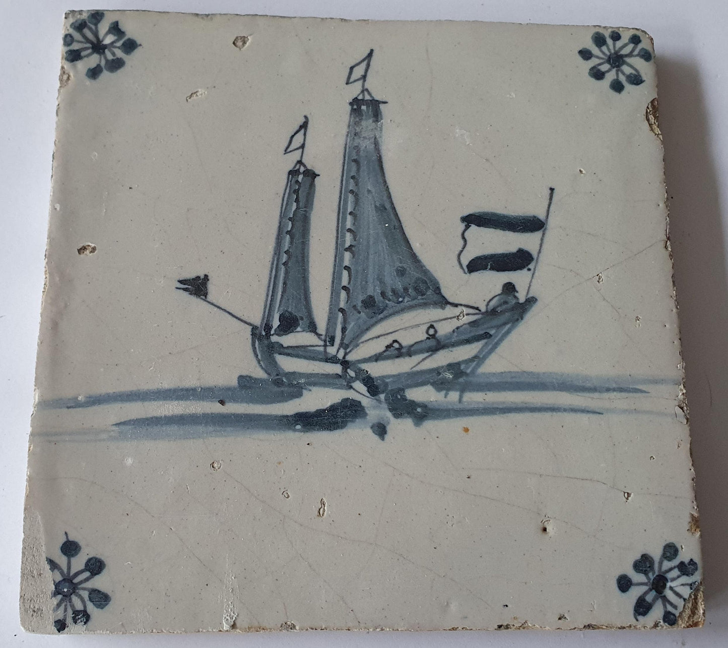 This Delft tile, dating from around 1660, depicts   sailship