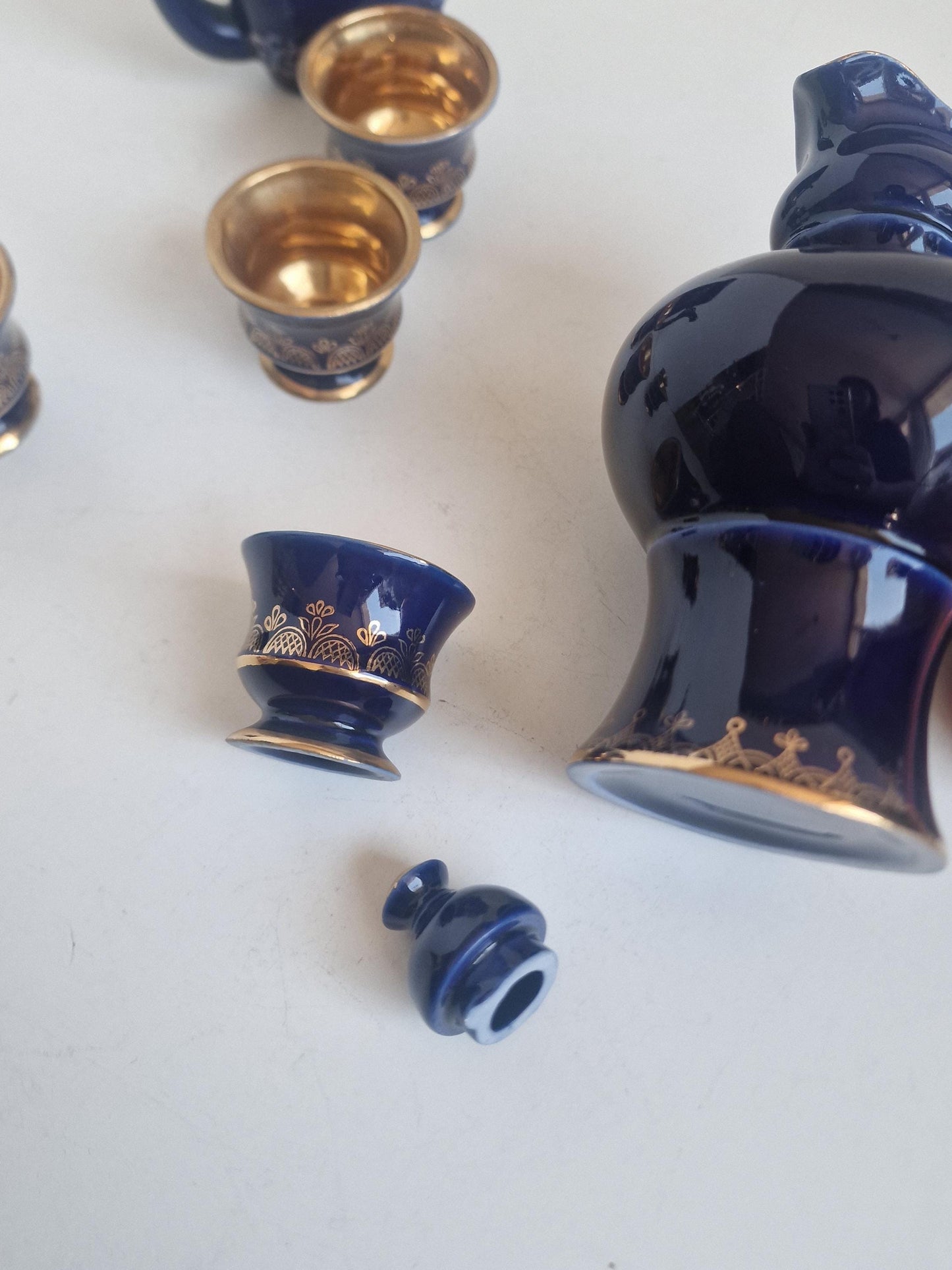 Vintage Soviet cobalt blue ceramic vodka / liqueur server set with goldinterior shot cups – Staraya Russa Russia. Authentic liquer serving