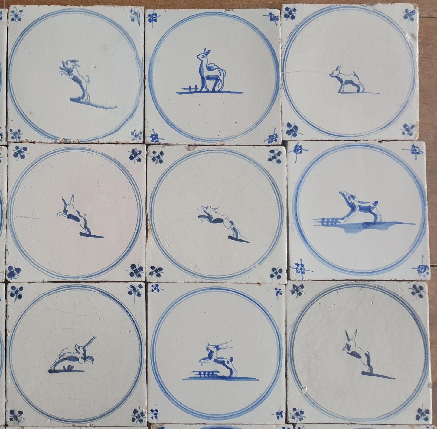 25 Antique Dutch Delft Tiles, 18th Century Animal Motifs circle springer