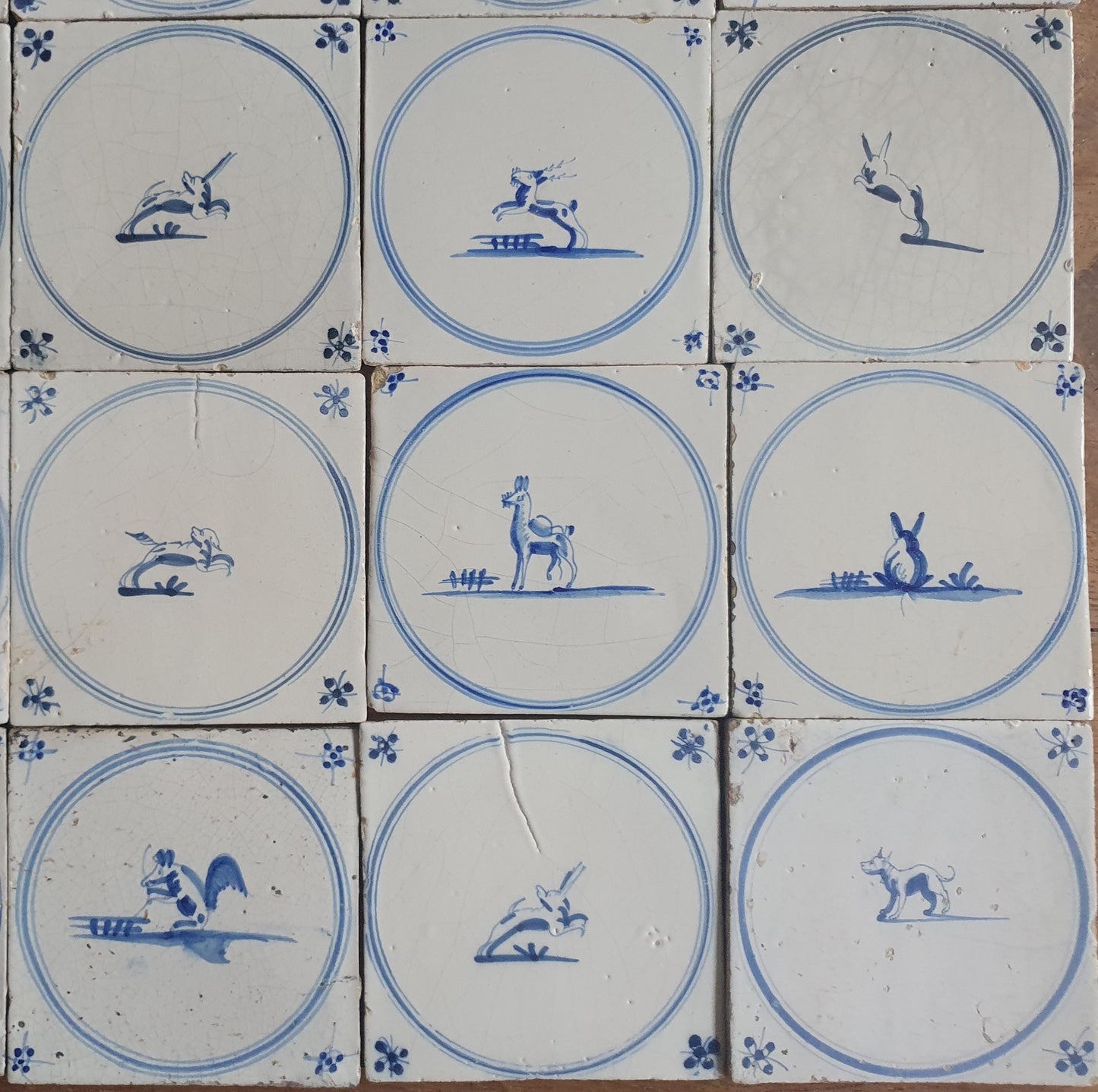 25 Antique Dutch Delft Tiles, 18th Century Animal Motifs circle springer