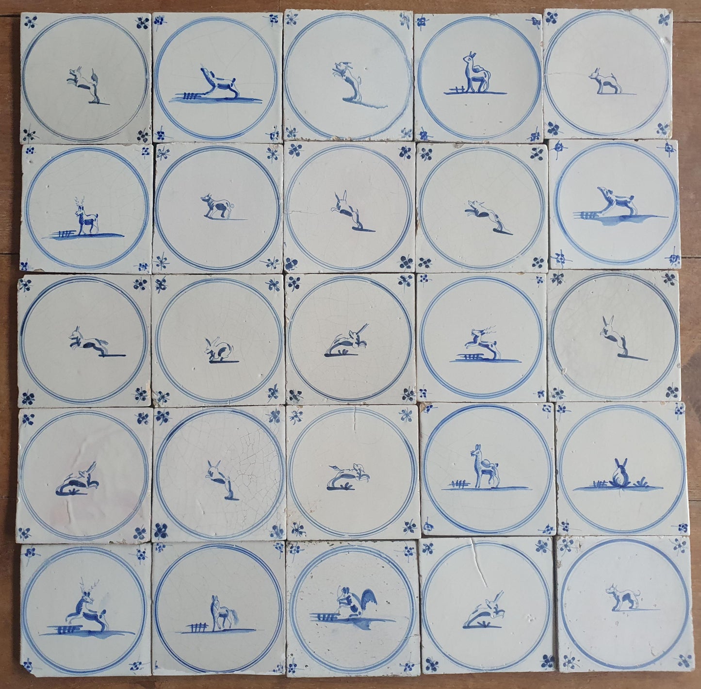 25 Antique Dutch Delft Tiles, 18th Century Animal Motifs circle springer