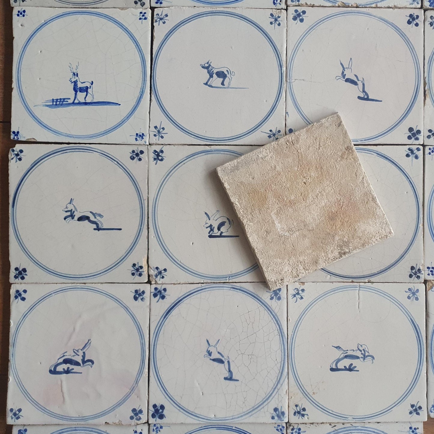 25 Antique Dutch Delft Tiles, 18th Century Animal Motifs circle springer