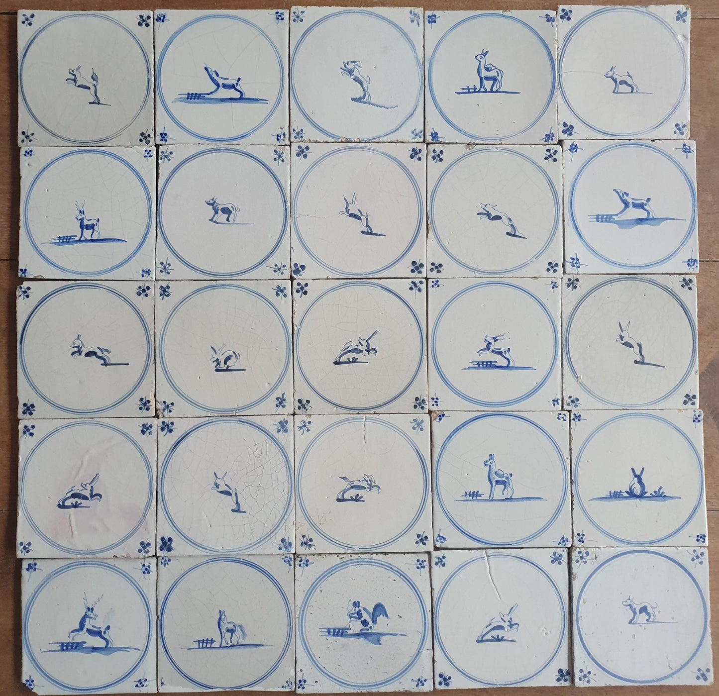 25 Antique Dutch Delft Tiles, 18th Century Animal Motifs circle springer