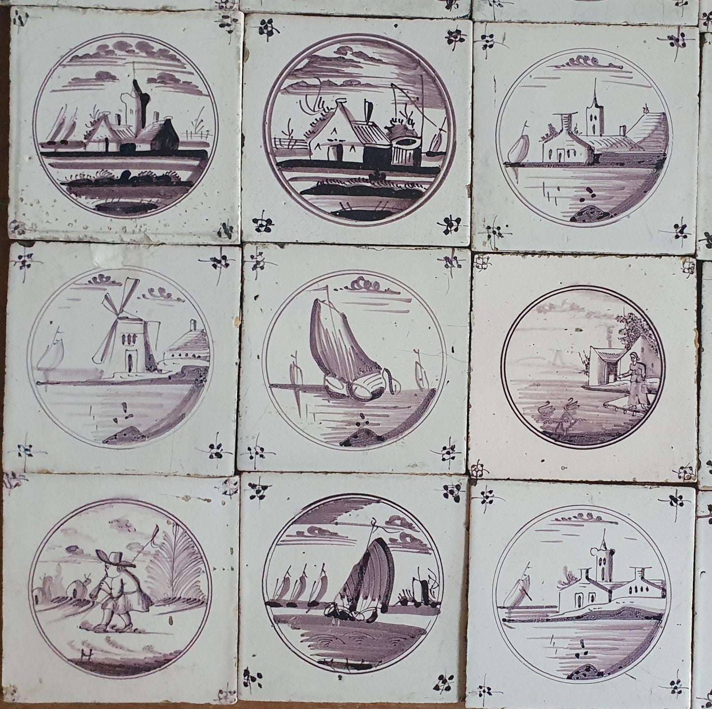 20 antieke Nederlandse wandtegels, cirkeltegels landschap in de kleur mangaan; Delft Blue Dutch backsplash fireplace tiles.