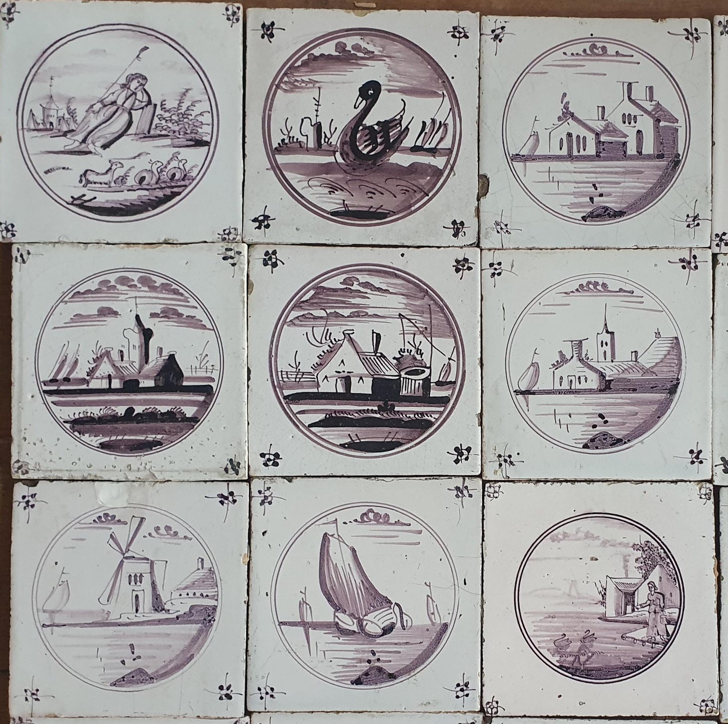 20 antieke Nederlandse wandtegels, cirkeltegels landschap in de kleur mangaan; Delft Blue Dutch backsplash fireplace tiles.