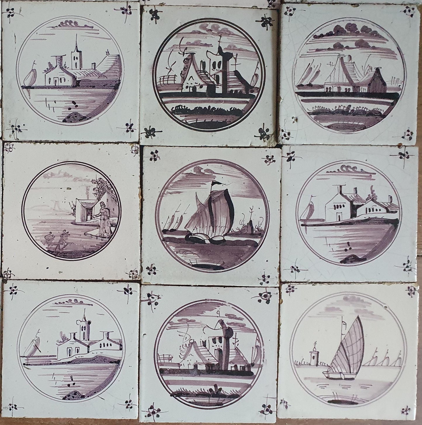 20 antieke Nederlandse wandtegels, cirkeltegels landschap in de kleur mangaan; Delft Blue Dutch backsplash fireplace tiles.