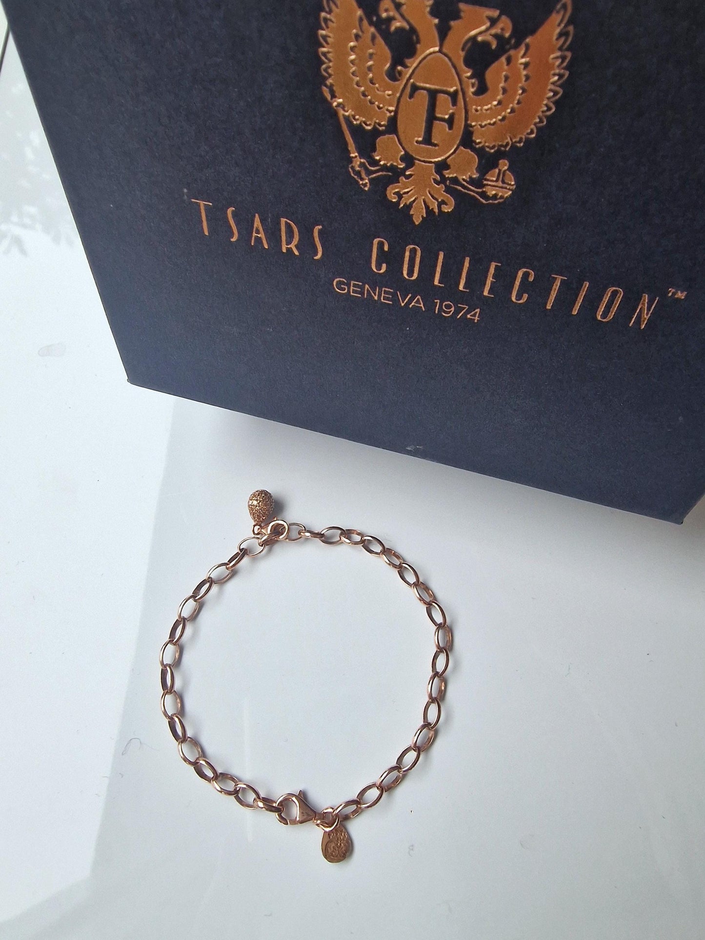 Fabergé Tsars Collection champagne rose goldgilt  Sterling Silver Bracelet with egg charm , faberge tatiana tsars collection