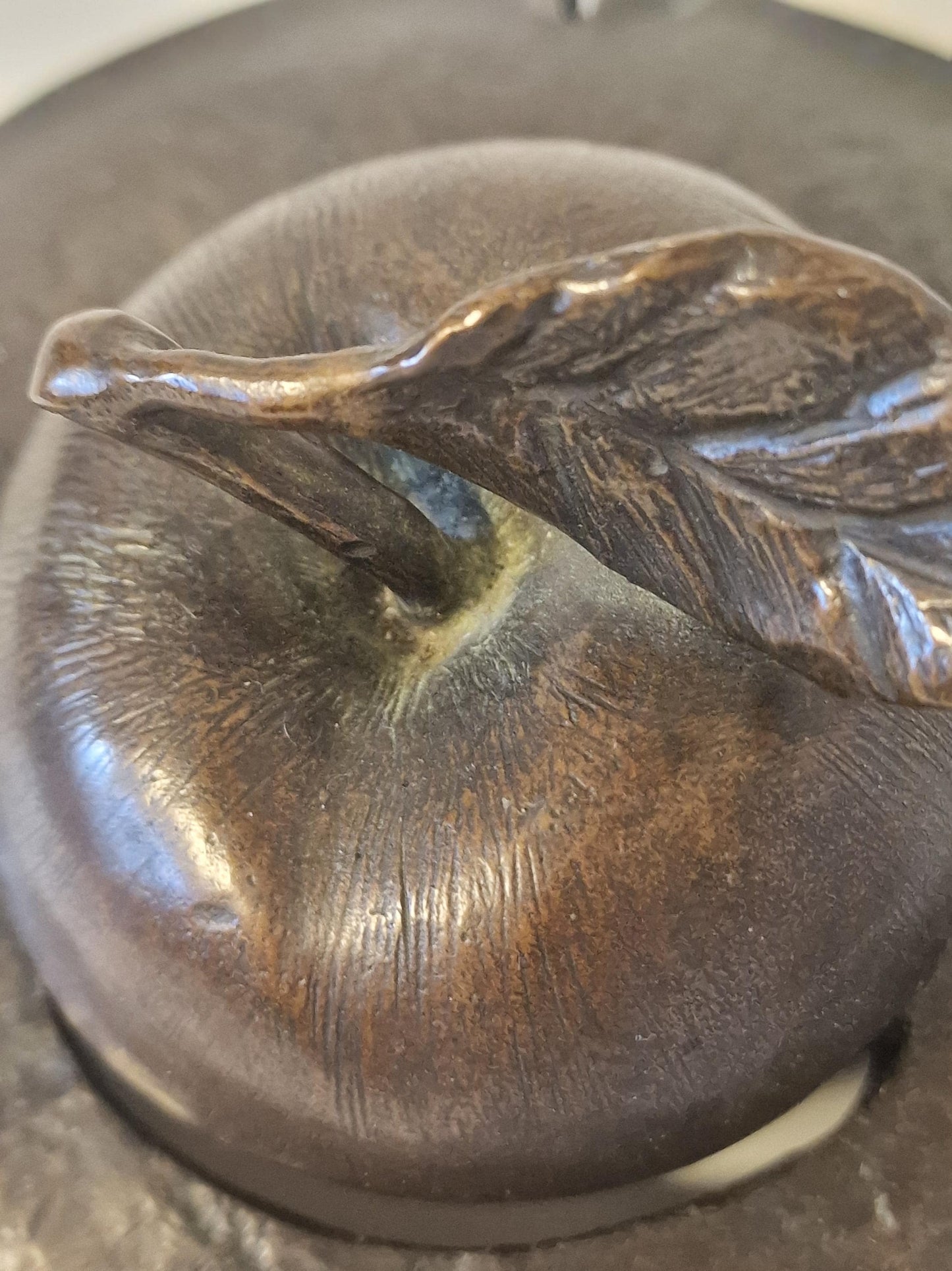 Bronze apple object / lid art