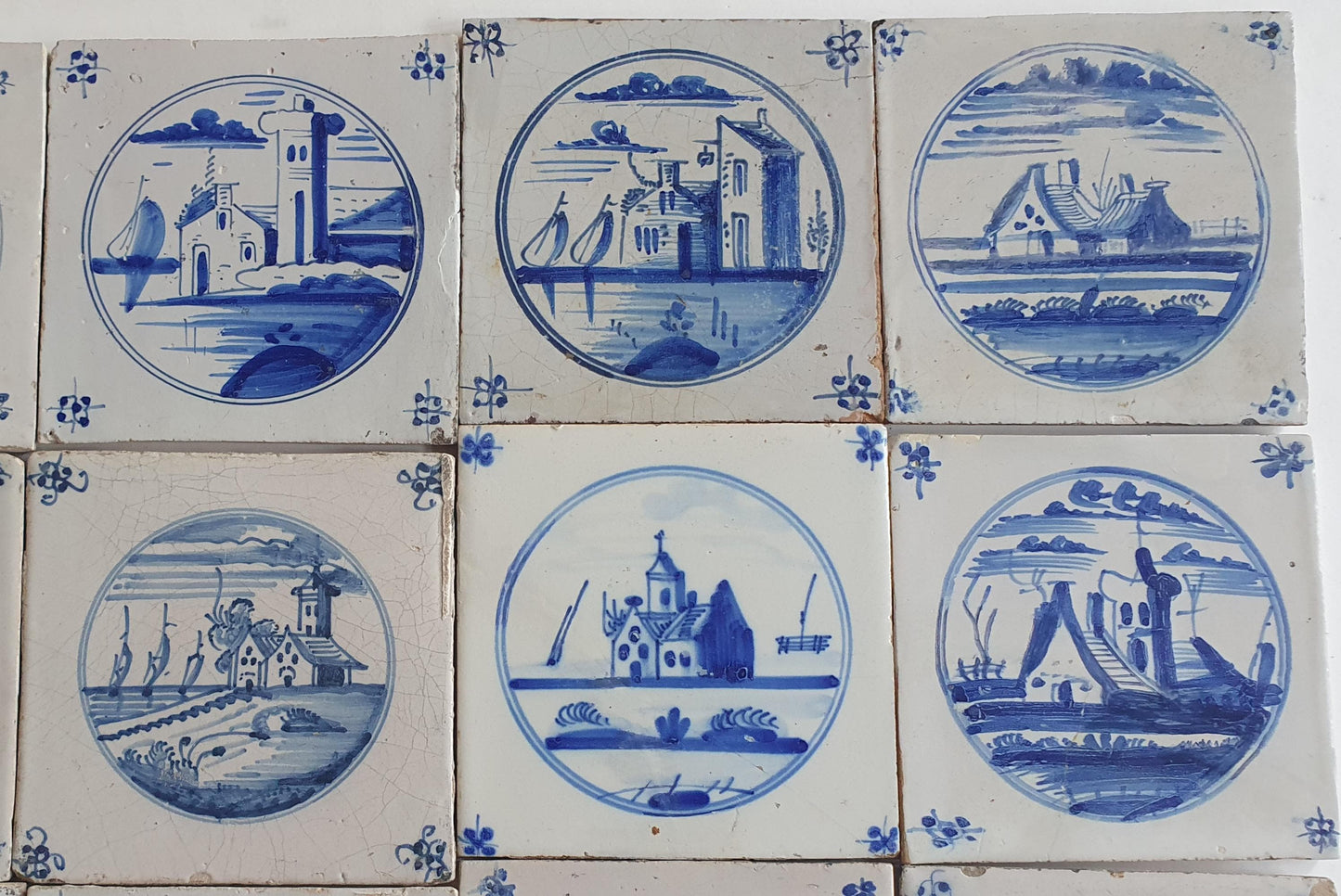 18th/19th  Delft tiles, a landscape of antique tiles of 20
