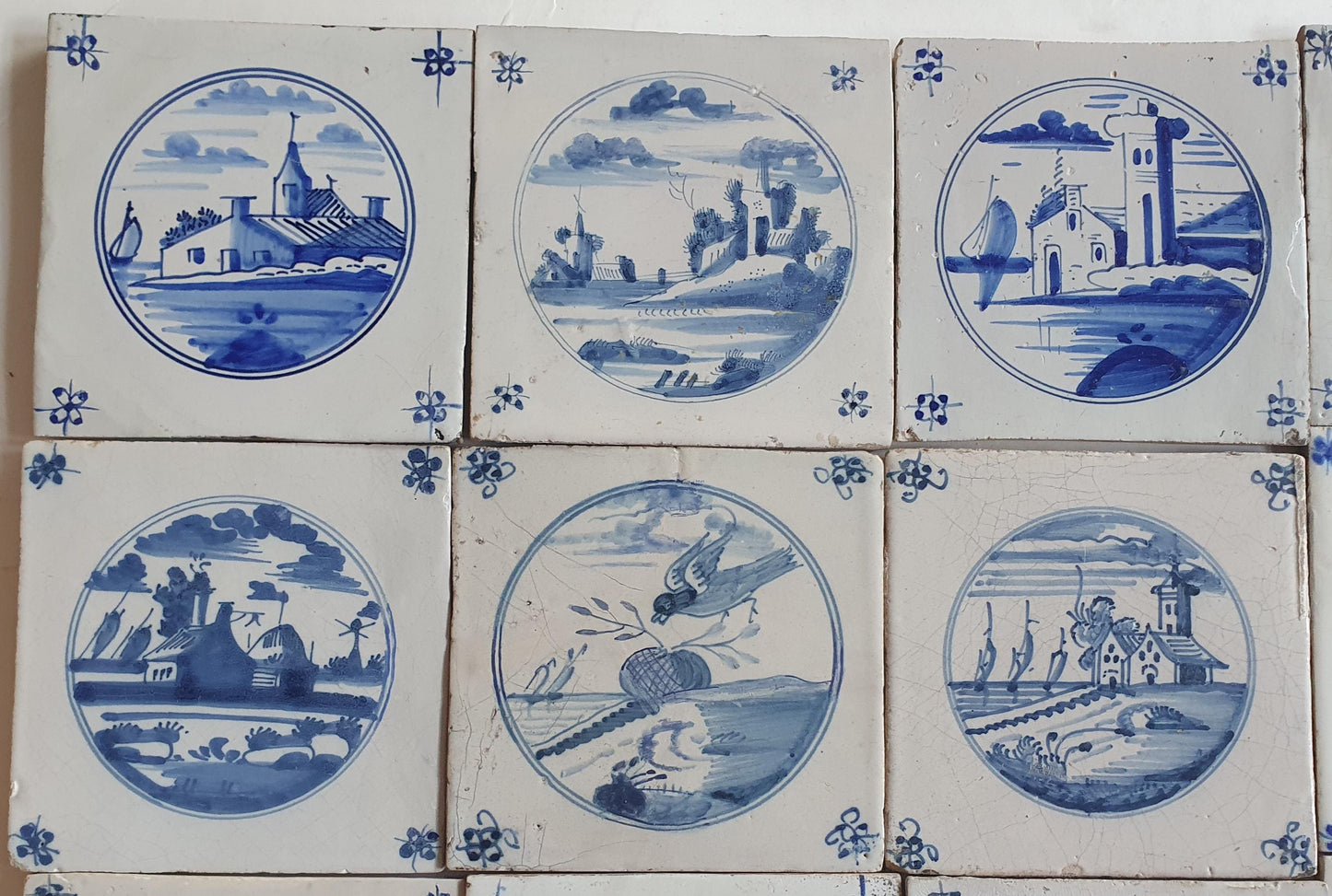 18th/19th  Delft tiles, a landscape of antique tiles of 20