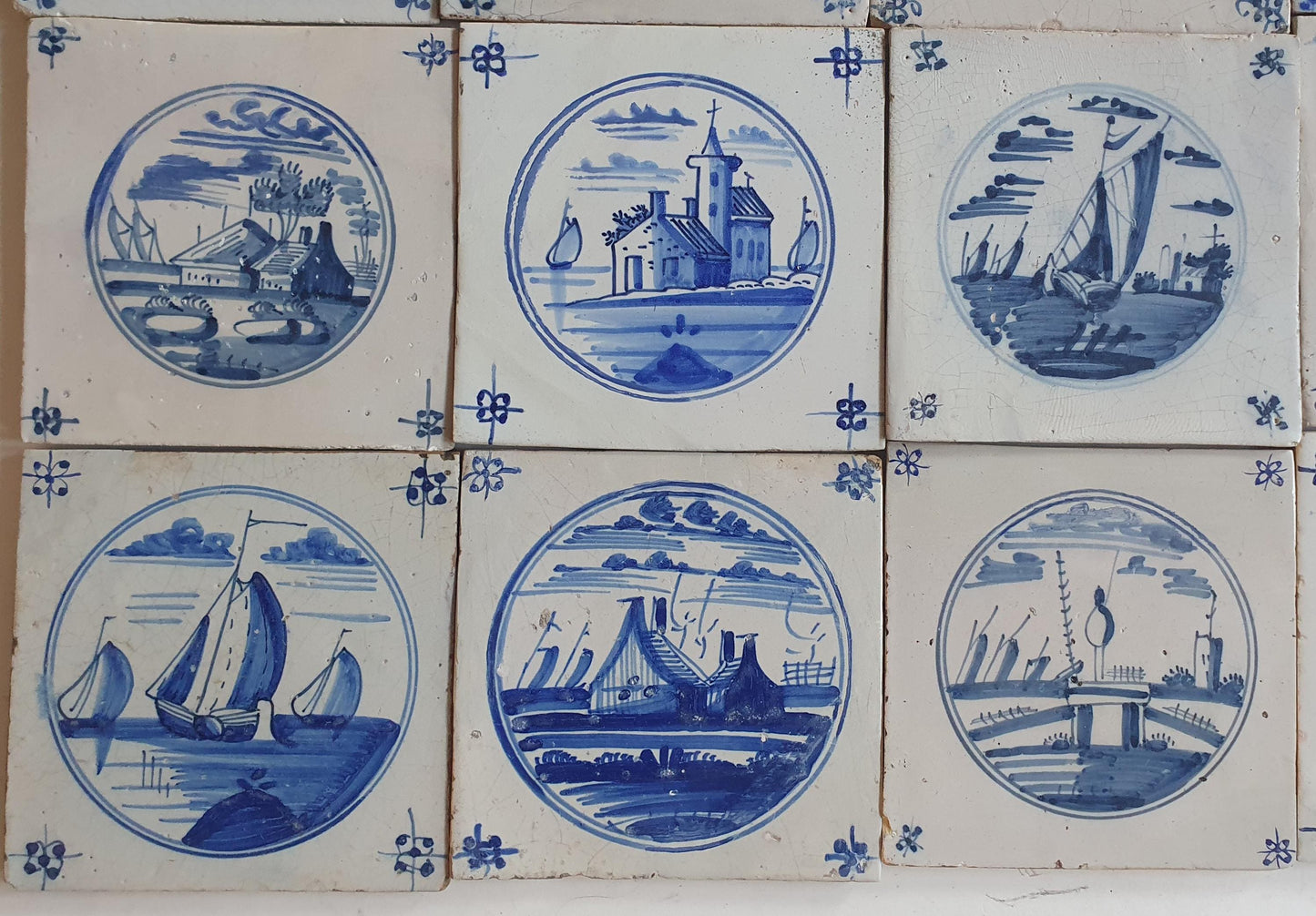 18th/19th  Delft tiles, a landscape of antique tiles of 20