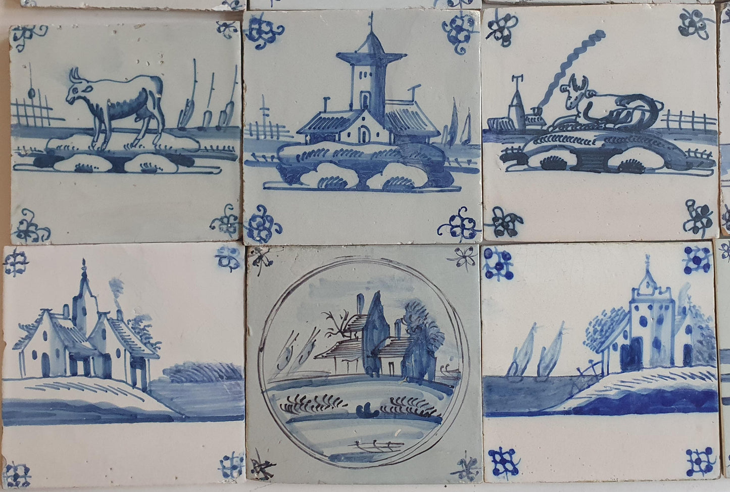 18th/19th  Delft tiles, a landscape of antique tiles of 24
