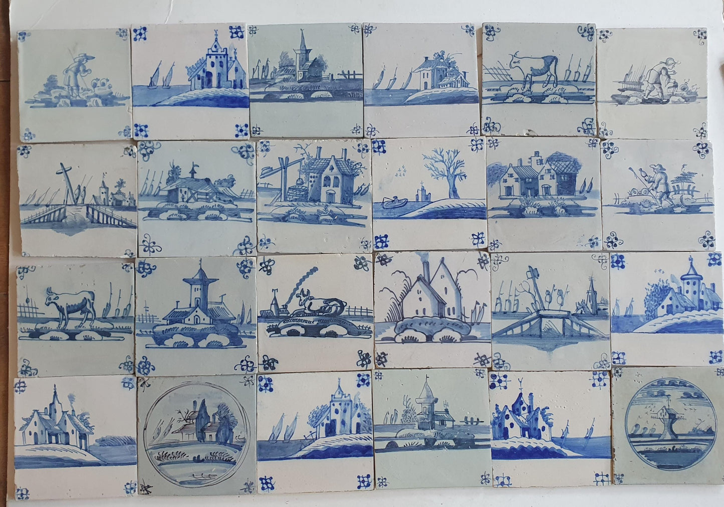 18th/19th  Delft tiles, a landscape of antique tiles of 24