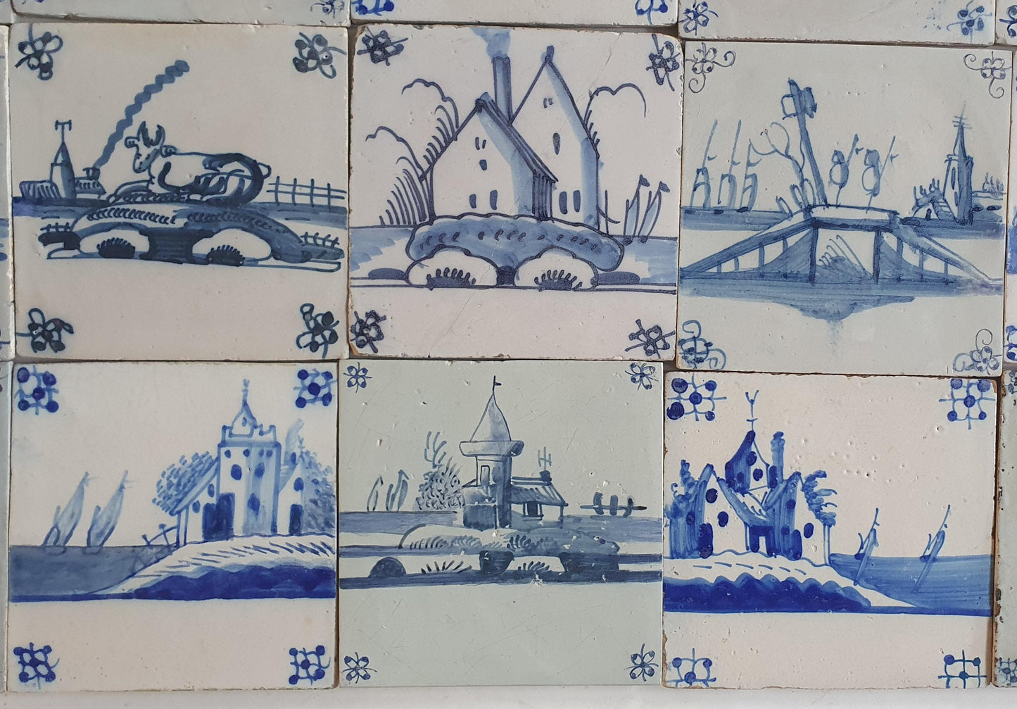 18th/19th  Delft tiles, a landscape of antique tiles of 24
