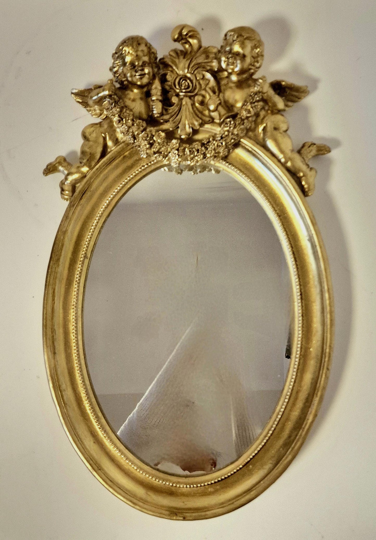 Louis XVI Gold oval Mirror, Cherubs Detail