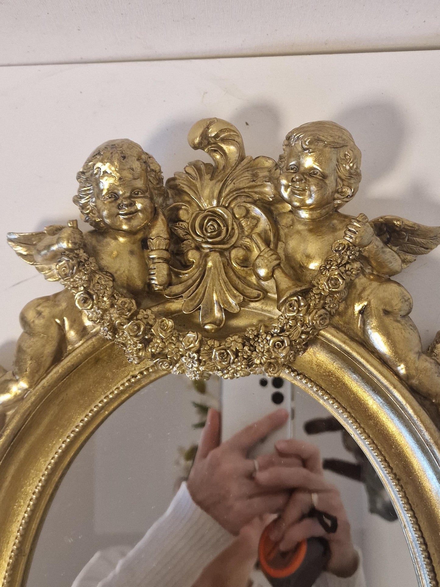 Louis XVI Gold oval Mirror, Cherubs Detail