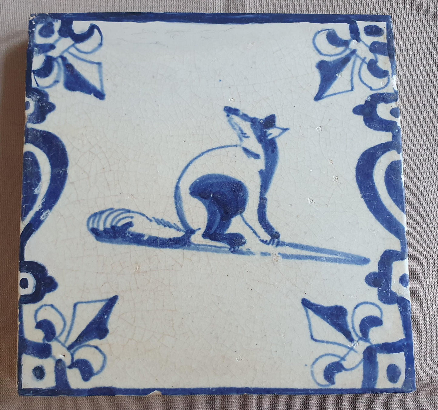 Dutch Delft  Tile, Fox in baluster, 17th century blue walltile, ca 1630