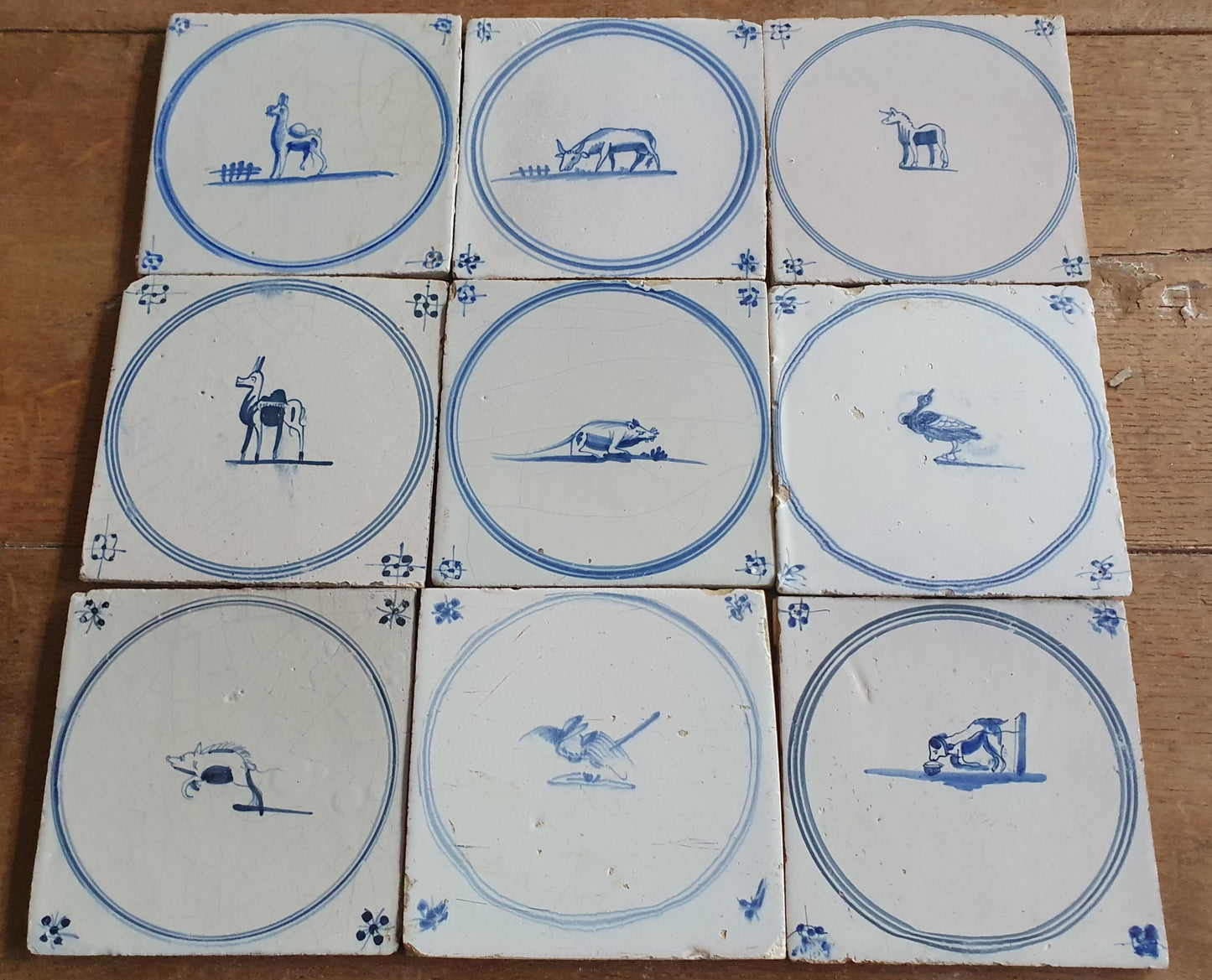 Antique Delft Tiles, 18th Century Dutch Animal Motifs, Set of 9 circle springer