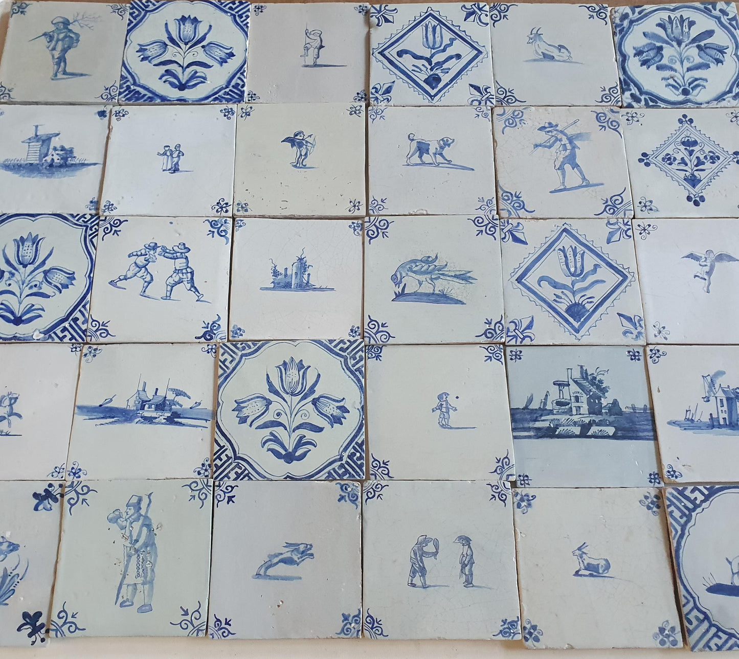 17th/18th  Delft tiles, a mix of antique tiles of 30