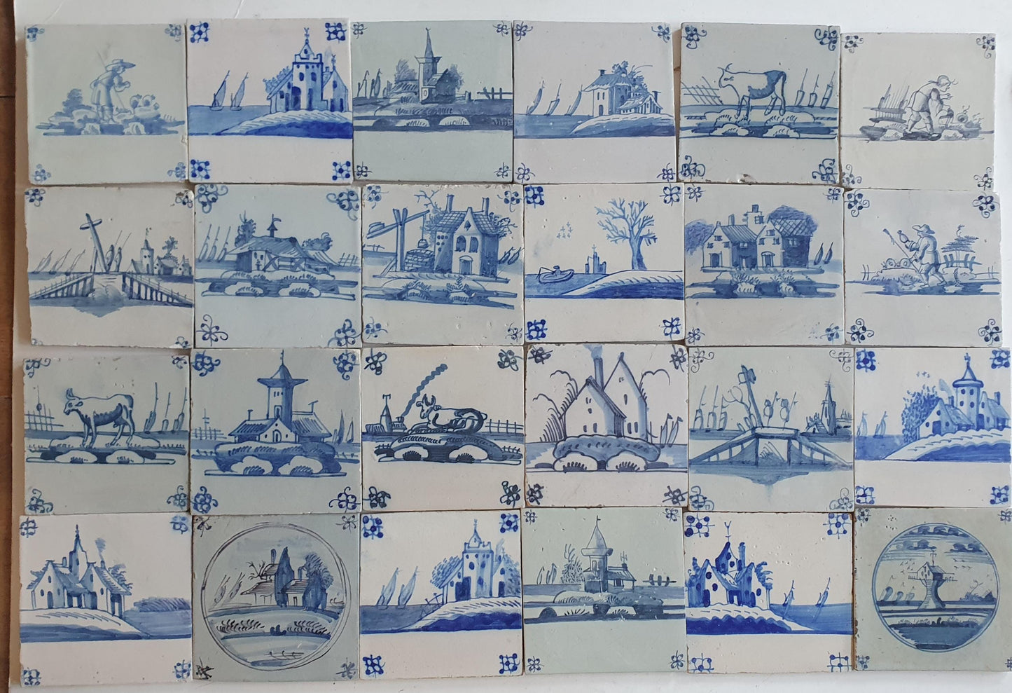 18th/19th  Delft tiles, a landscape of antique tiles of 24