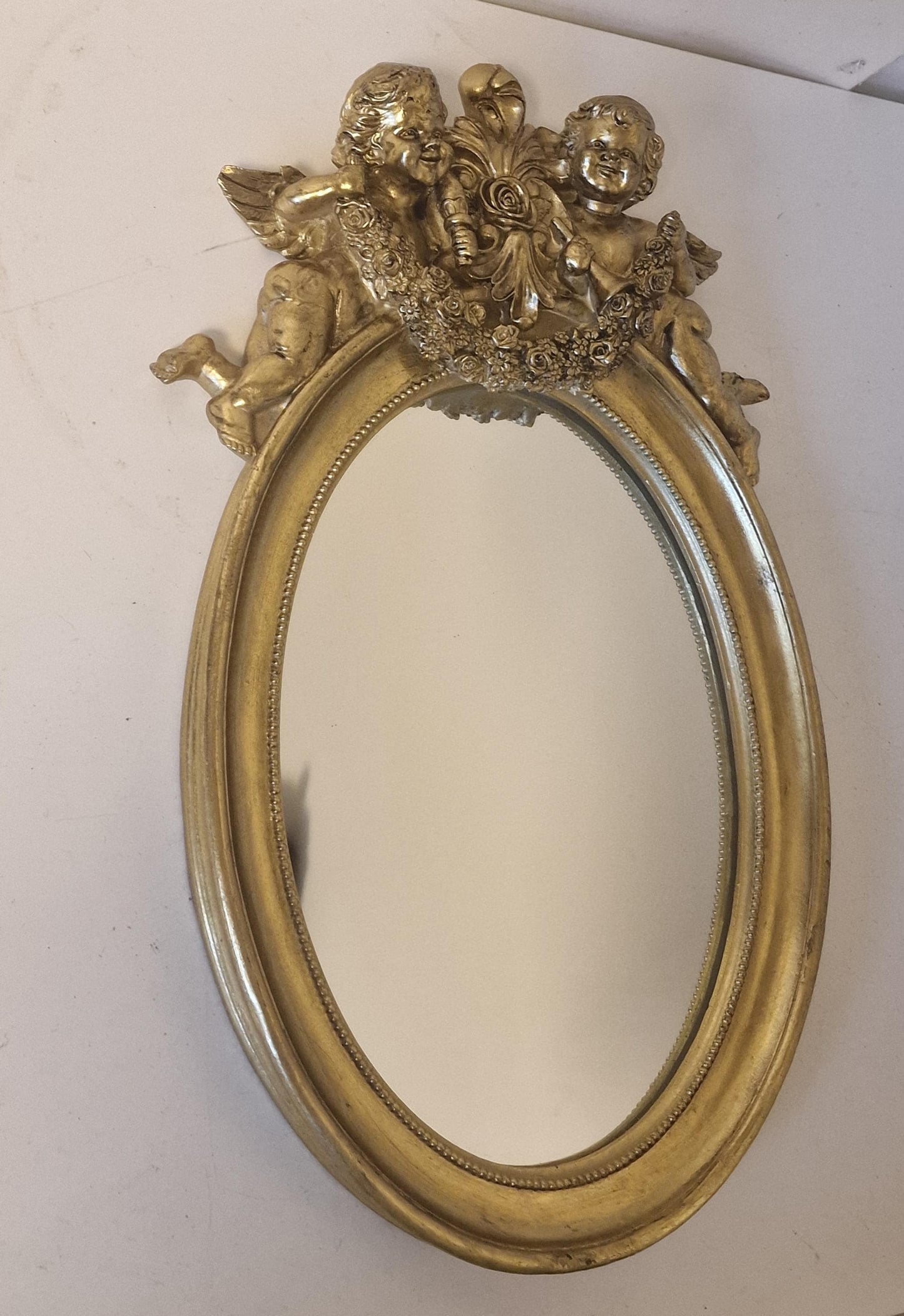 Louis XVI Gold oval Mirror, Cherubs Detail
