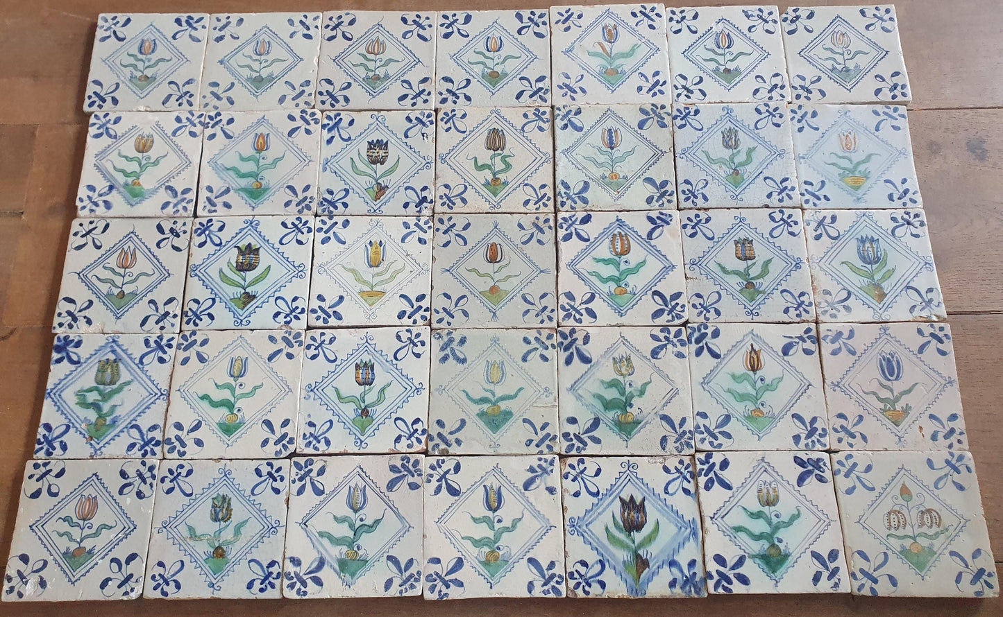 35 x Dutch Delft Blue Tilefield, Tulip squared, 17th century, antique collectable and backsplash fireplace kitchen tiles, Set of 35.