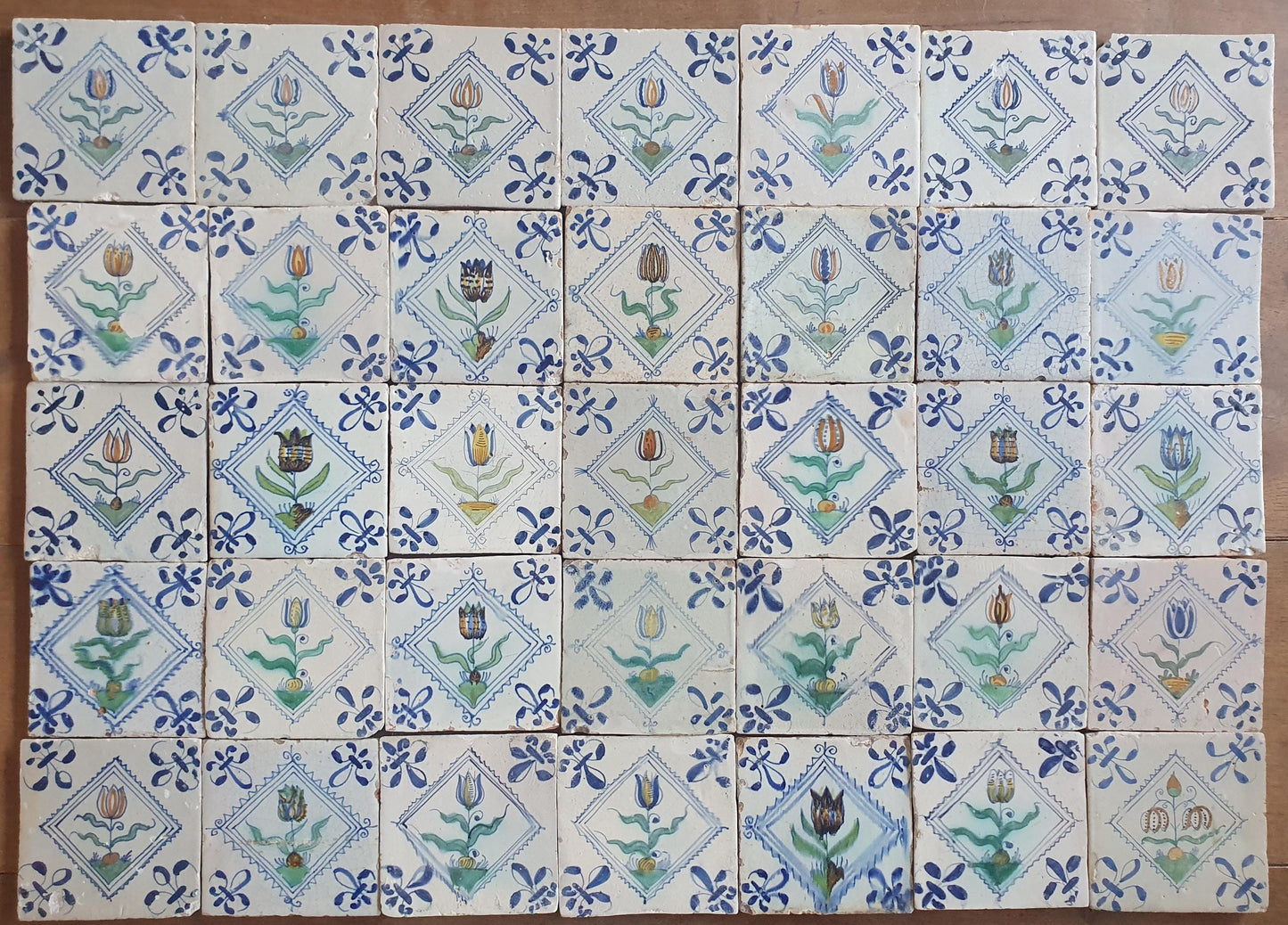35 x Dutch Delft Blue Tilefield, Tulip squared, 17th century, antique collectable and backsplash fireplace kitchen tiles, Set of 35.