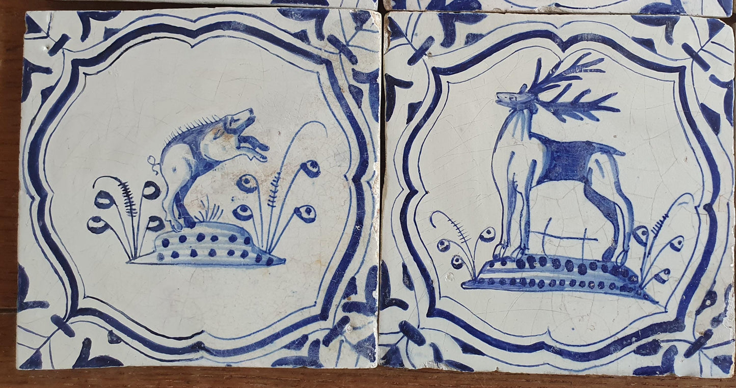 6 x Dutch rare Tiles, representing animals which are captured in an accolade shaped border with 'winged-leaf' corner motifs.