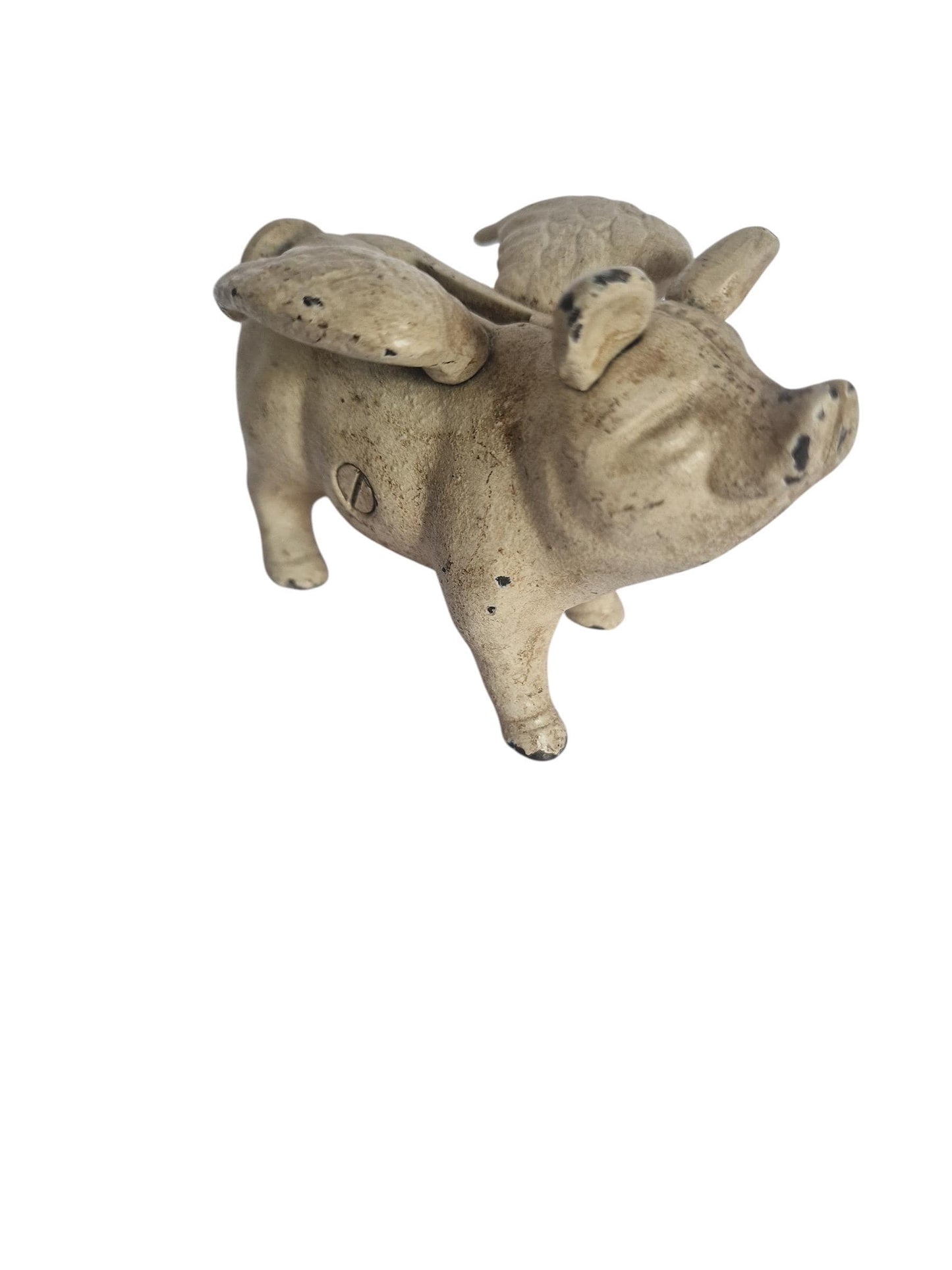 Vintage cast iron flying pig coin bank.