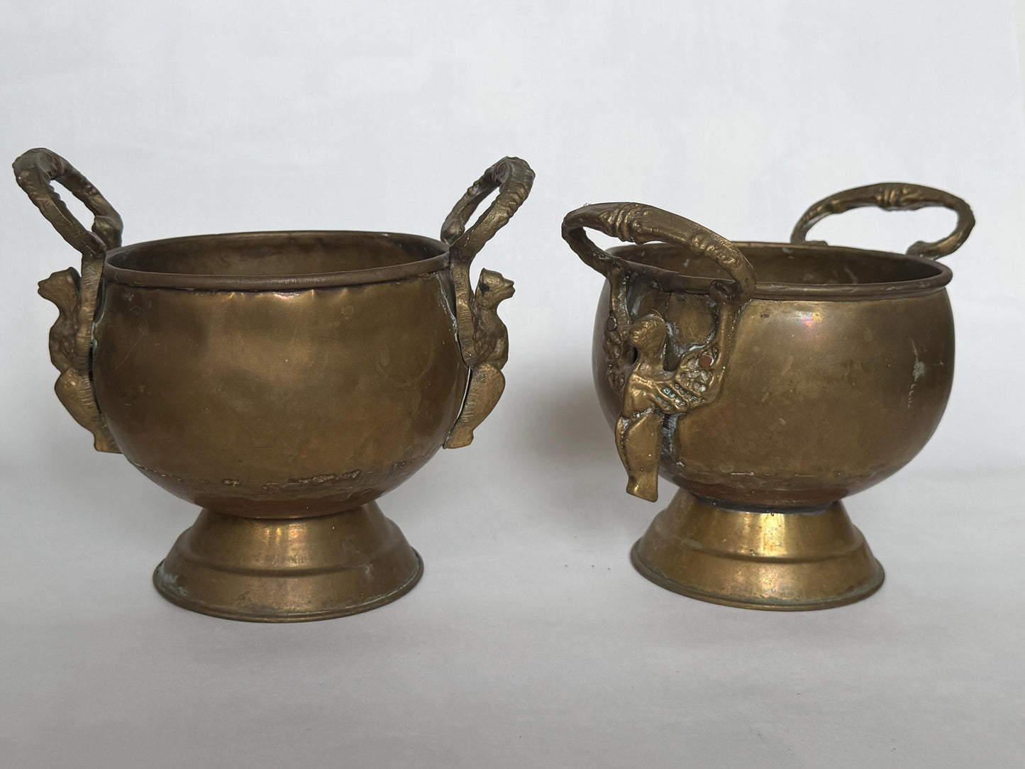 Antique Pair of Art Nouveau Cachepots with Mythical Winged Siren Handles c.1900–1920, set planters in red and yellow copper and brass