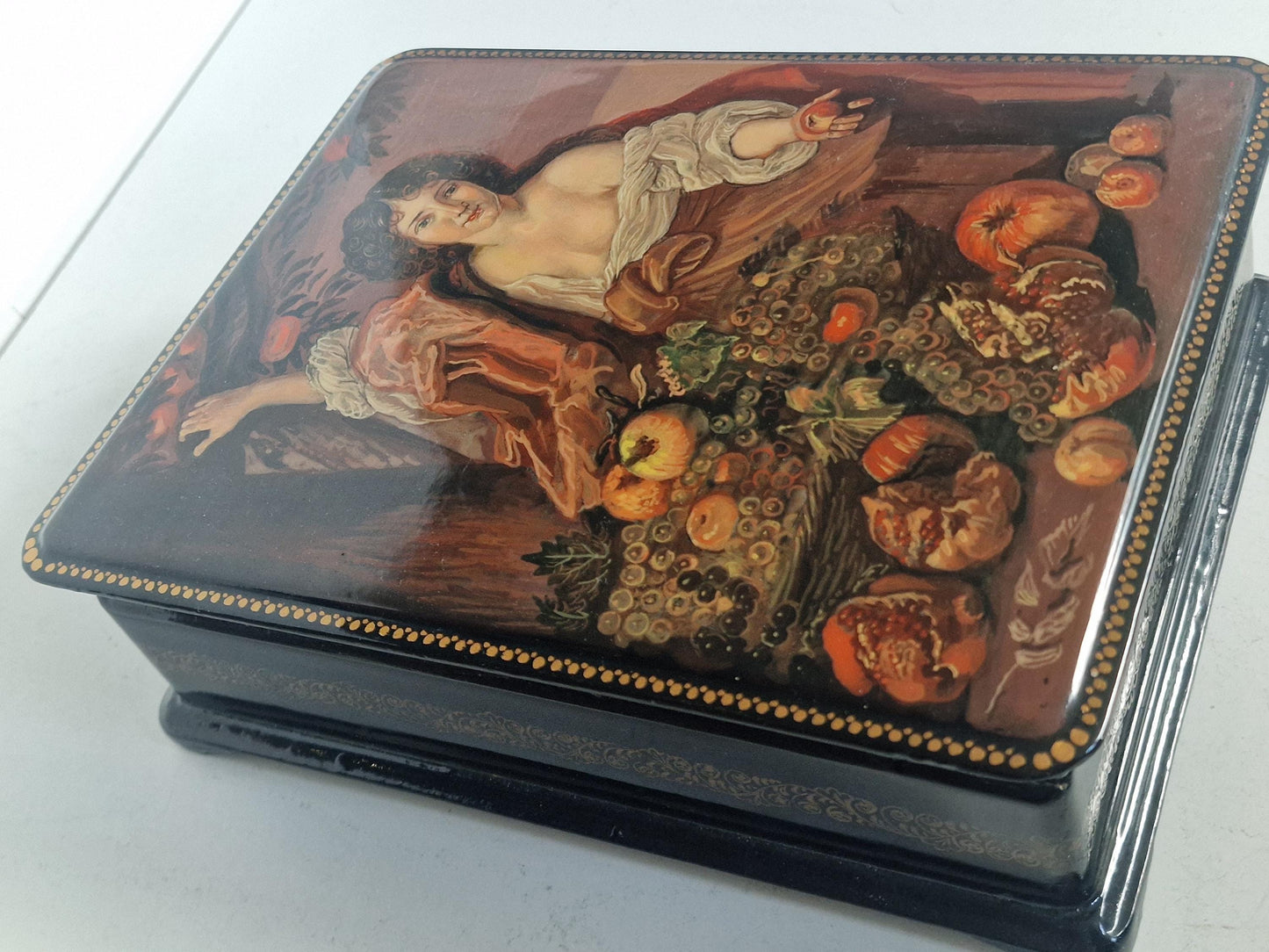 Large Russian Fedoskino school lacquer box, hand painted by A.A. Rozhkov, titled Picking Fruit, c. 2000.