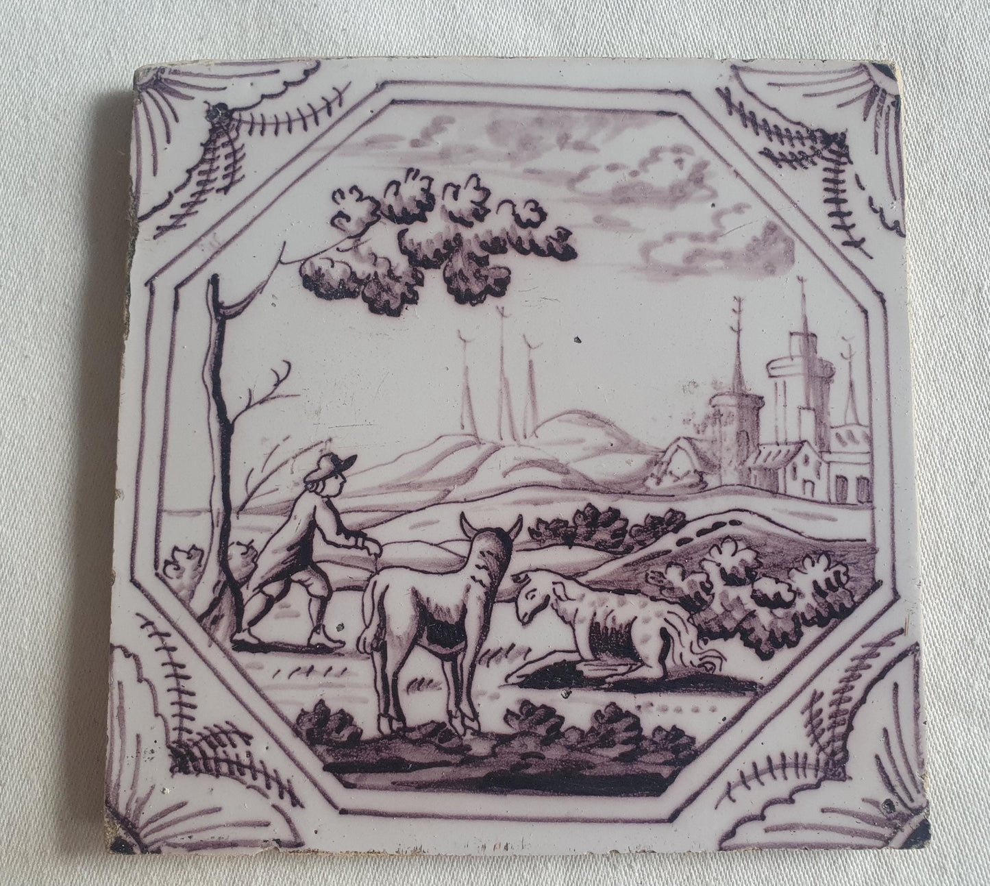 Delft tile, man and two animals 18th century (c. 1760) Dutchmanganese tile . ( Animal tile )