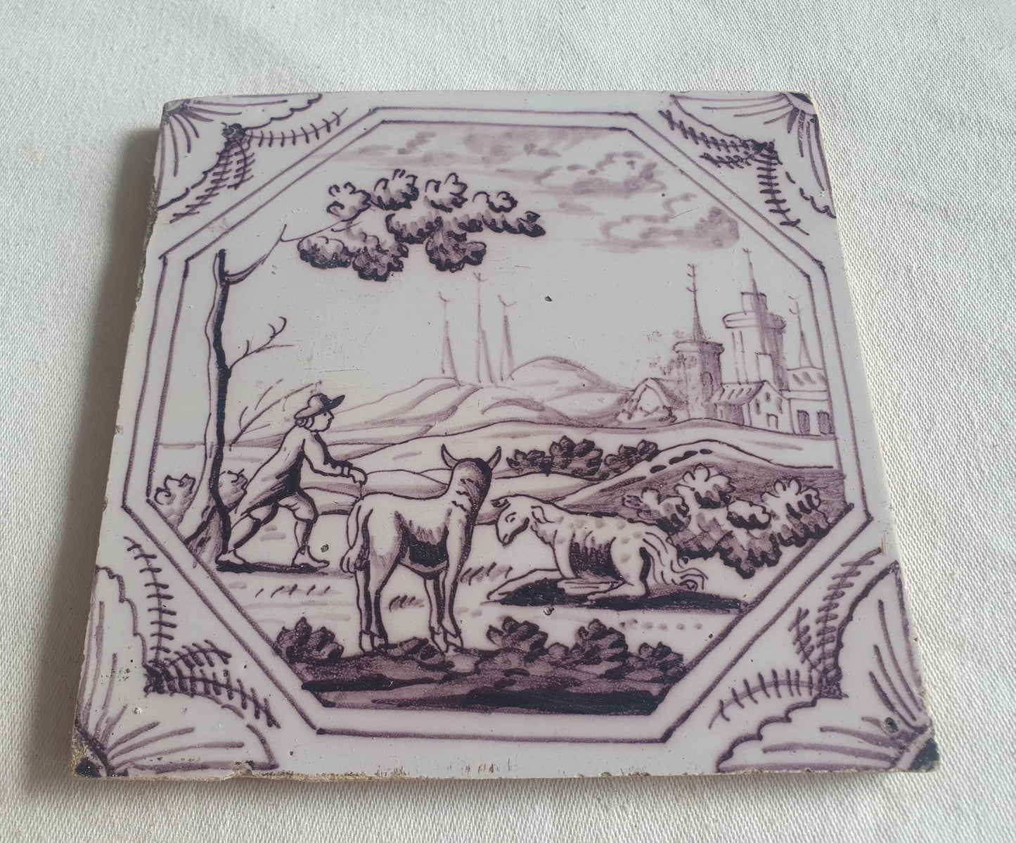 Delft tile, man and two animals 18th century (c. 1760) Dutchmanganese tile . ( Animal tile )