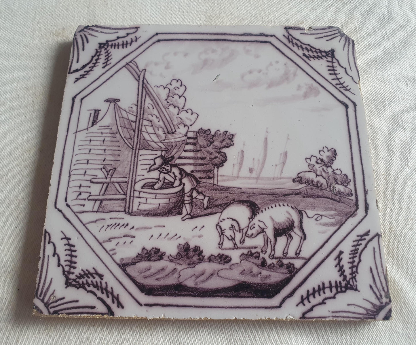 Delft tile, man and two pigs 18th century (c. 1760) Dutchmanganese tile . ( Animal tile )