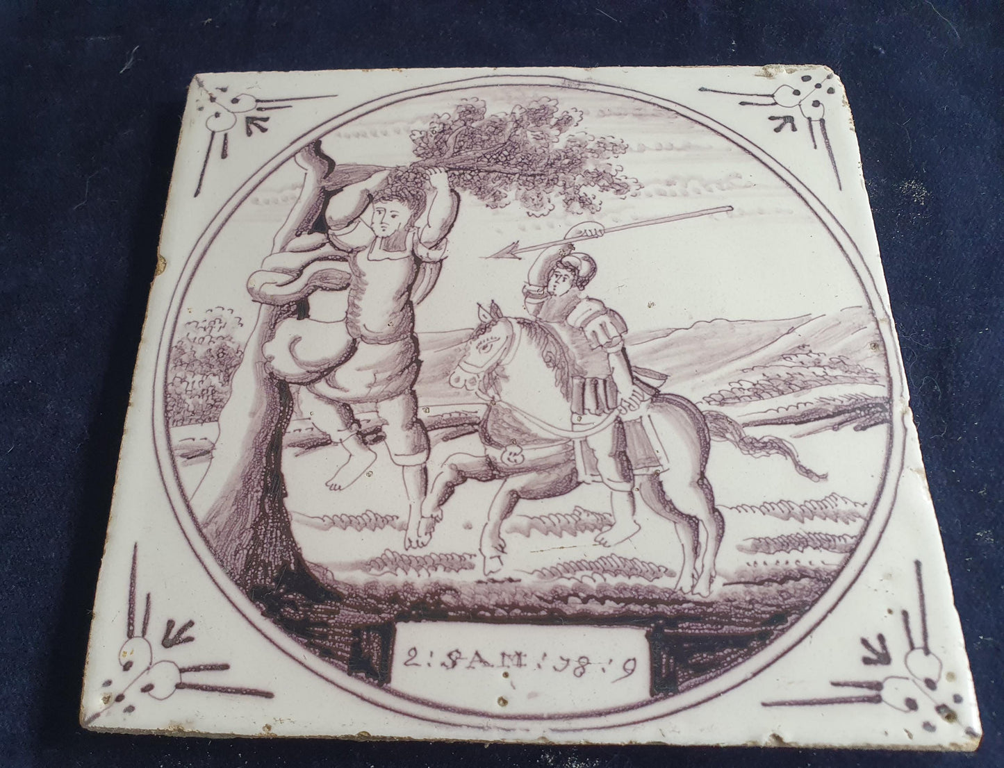 Delft tile, Dutch manganese biblical scene bible tile, 18th century , Absalom flees on horseback during a battle.